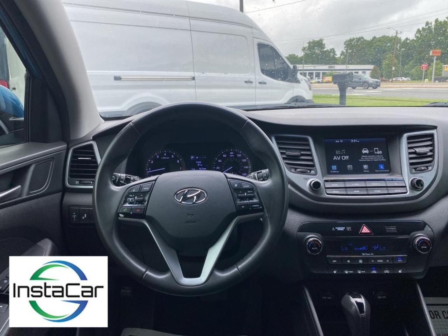 2018 Caribbean Blue /Black Hyundai Tucson Value (KM8J33A24JU) with an L4, 1.6L engine, 7-speed auto-shift manual transmission, located at 3147 E Independence Blvd, Charlotte, NC, 28205, 35.200268, -80.773651 - <b>Equipment</b><br>The satellite radio system in this vehicle gives you access to hundreds of nation-wide radio stations with a clear digital signal. This 2018 Hyundai Tucson keeps you comfortable with Auto Climate. The rear parking assist technology on the Hyundai Tucson will put you at ease whe - Photo#28