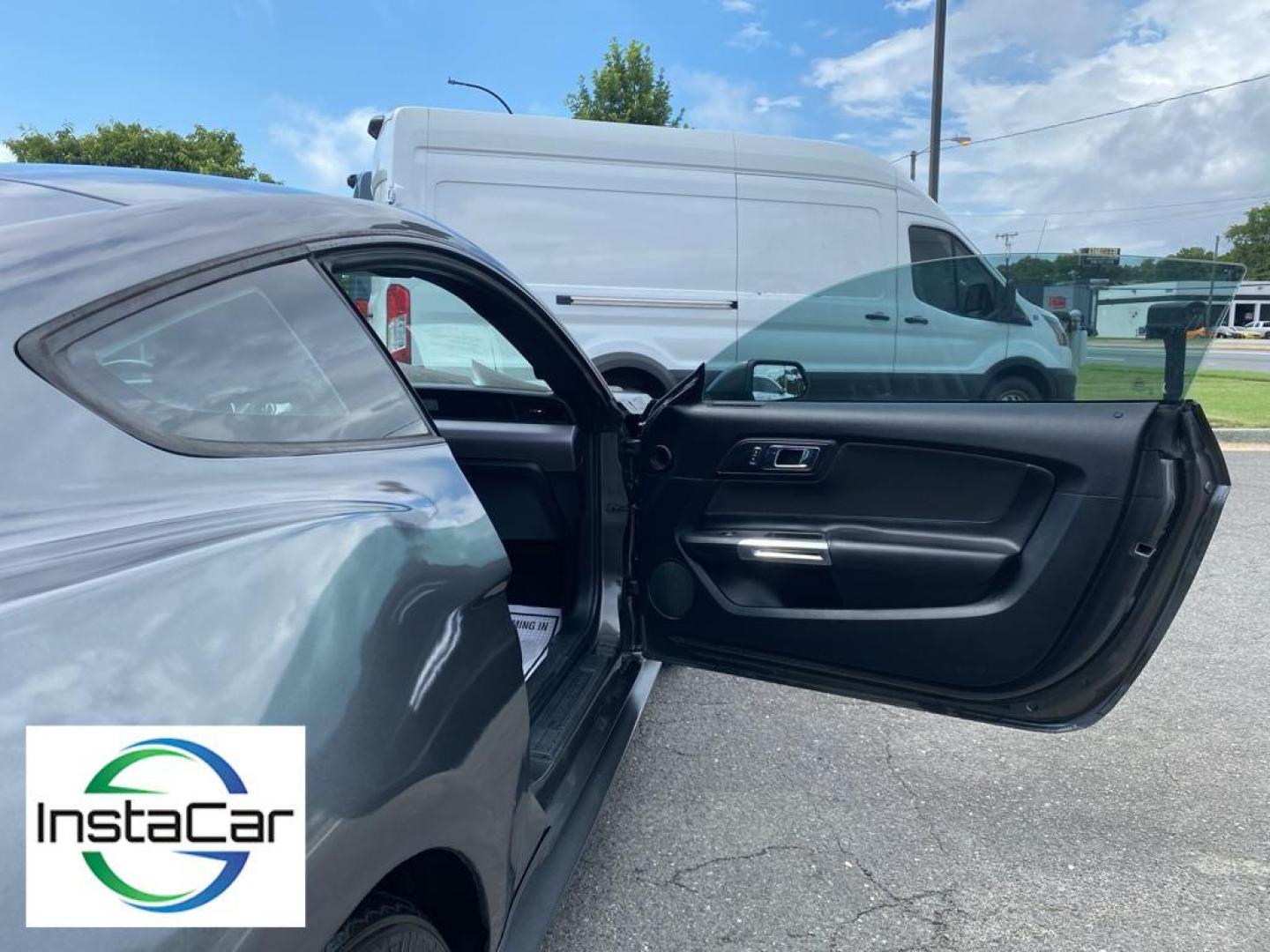 2017 Magnetic Metallic /Ebony Ford Mustang EcoBoost (1FA6P8TH6H5) with an L4, 2.3L engine, Manual 6-Speed transmission, located at 3147 E Independence Blvd, Charlotte, NC, 28205, 35.200268, -80.773651 - <b>Equipment</b><br>The HID headlamps on the Ford Mustang light your way like never before. Bluetooth technology is built into this vehicle, keeping your hands on the steering wheel and your focus on the road. Protect this small car from unwanted accidents with a cutting edge backup camera system. I - Photo#18