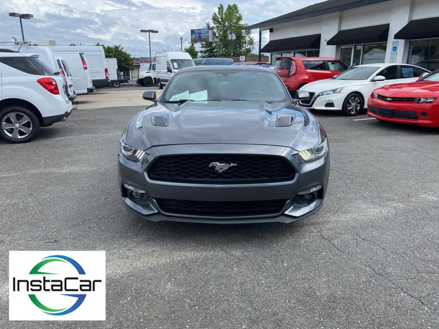 2017 Magnetic Metallic /Ebony Ford Mustang EcoBoost (1FA6P8TH6H5) with an L4, 2.3L engine, Manual 6-Speed transmission, located at 3147 E Independence Blvd, Charlotte, NC, 28205, 35.200268, -80.773651 - <b>Equipment</b><br>The HID headlamps on the Ford Mustang light your way like never before. Bluetooth technology is built into this vehicle, keeping your hands on the steering wheel and your focus on the road. Protect this small car from unwanted accidents with a cutting edge backup camera system. I - Photo#5