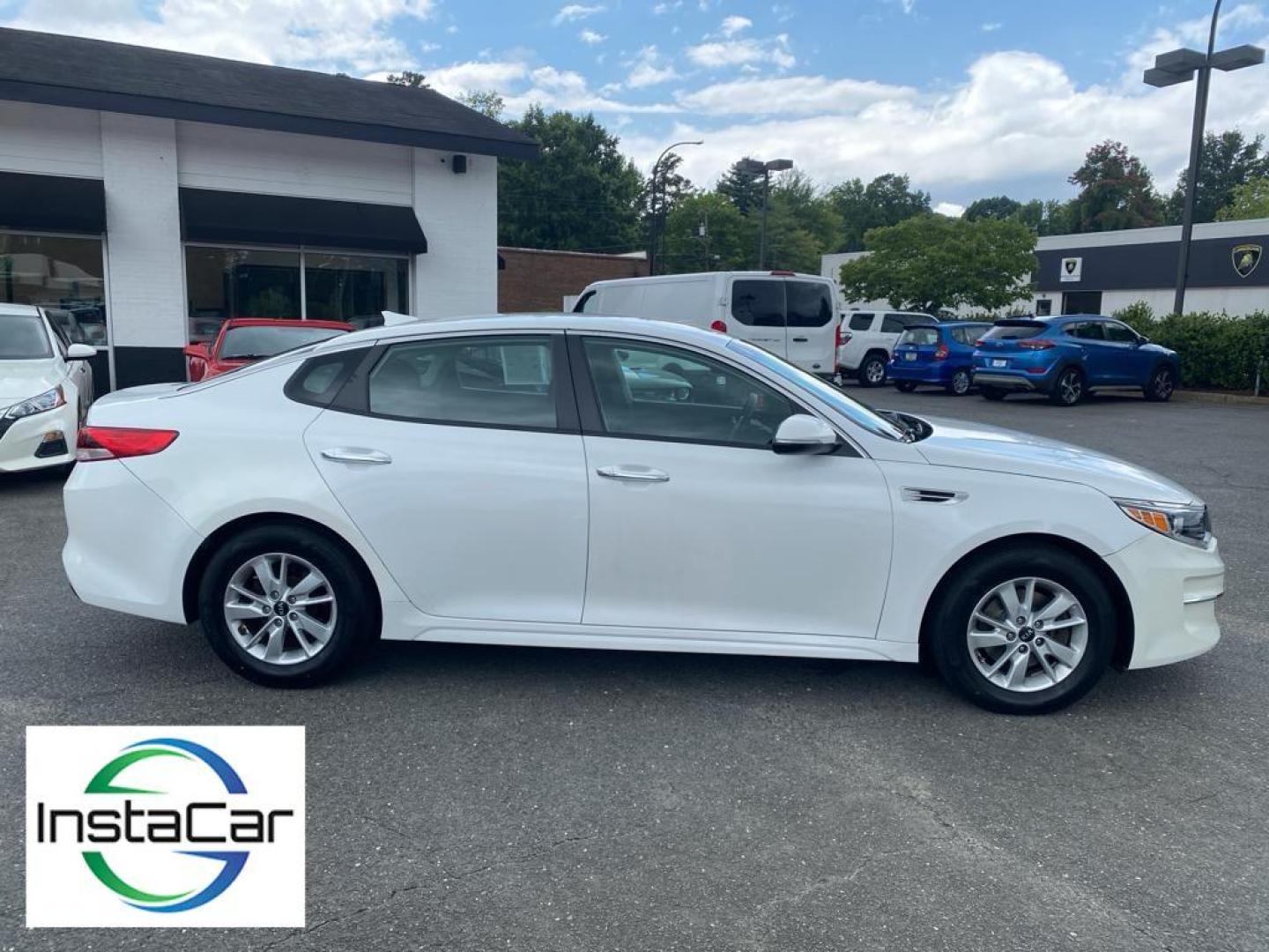 2018 WHITE Kia Optima (5XXGT4L36JG) with an L4, 2.4L engine, Automatic transmission, located at 3147 E Independence Blvd, Charlotte, NC, 28205, 35.200268, -80.773651 - Get ready to elevate your driving experience with this stunning 2018 Kia Optima! This sleek sedan is the perfect blend of style, performance, and advanced technology. Under the hood, you'll find a robust L4, 2.4L engine that delivers impressive power and efficiency, paired with a smooth Front-Wheel - Photo#12