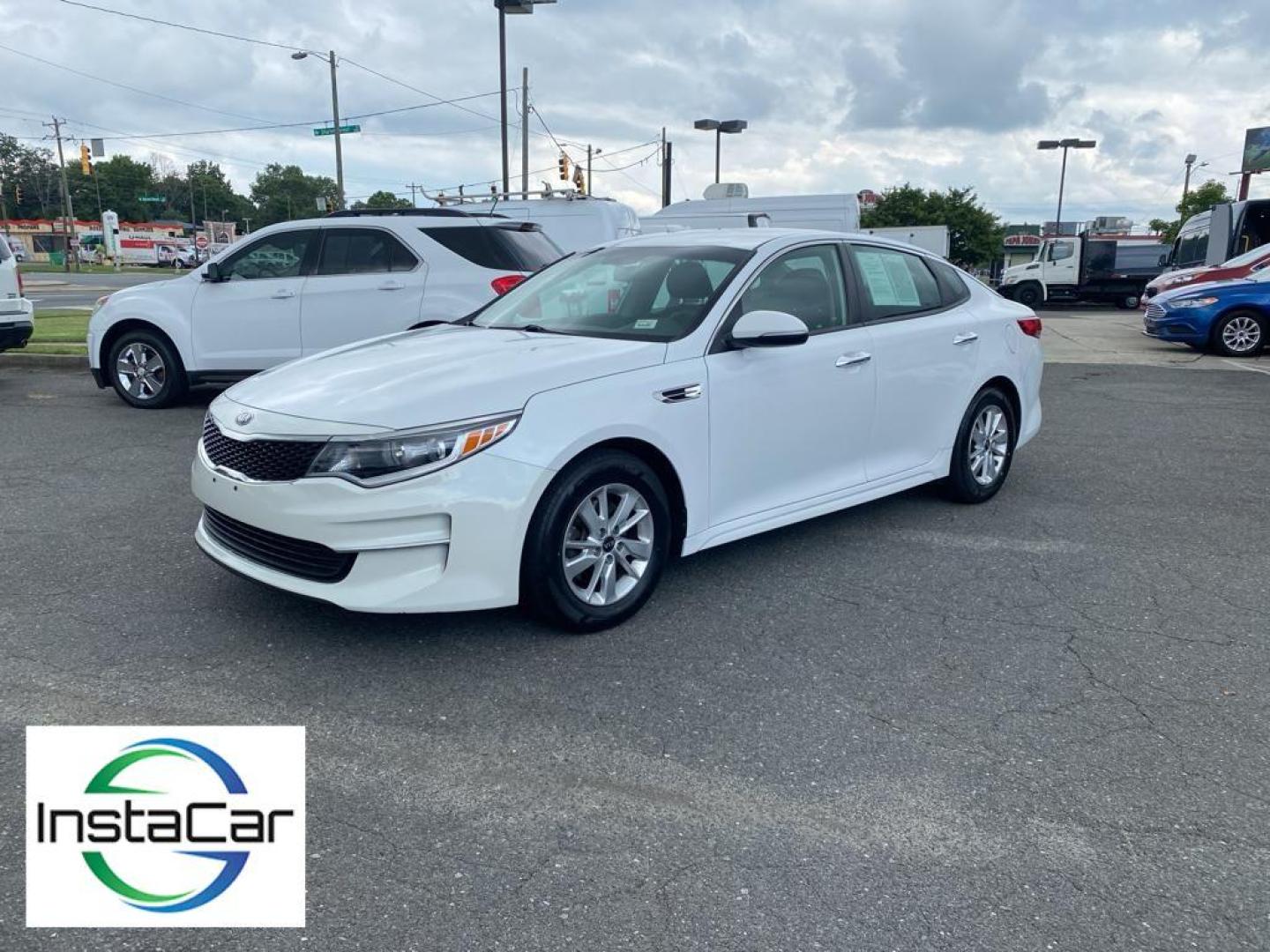 2018 WHITE Kia Optima (5XXGT4L36JG) with an L4, 2.4L engine, Automatic transmission, located at 3147 E Independence Blvd, Charlotte, NC, 28205, 35.200268, -80.773651 - Get ready to elevate your driving experience with this stunning 2018 Kia Optima! This sleek sedan is the perfect blend of style, performance, and advanced technology. Under the hood, you'll find a robust L4, 2.4L engine that delivers impressive power and efficiency, paired with a smooth Front-Wheel - Photo#7