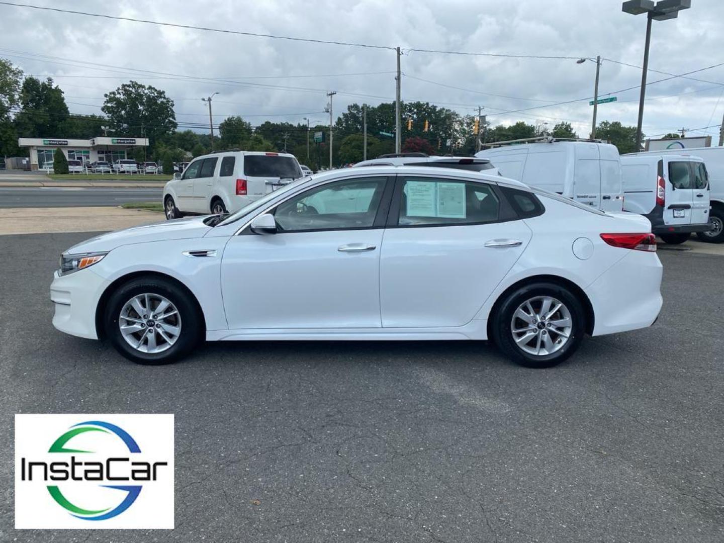 2018 WHITE Kia Optima (5XXGT4L36JG) with an L4, 2.4L engine, Automatic transmission, located at 3147 E Independence Blvd, Charlotte, NC, 28205, 35.200268, -80.773651 - Get ready to elevate your driving experience with this stunning 2018 Kia Optima! This sleek sedan is the perfect blend of style, performance, and advanced technology. Under the hood, you'll find a robust L4, 2.4L engine that delivers impressive power and efficiency, paired with a smooth Front-Wheel - Photo#8