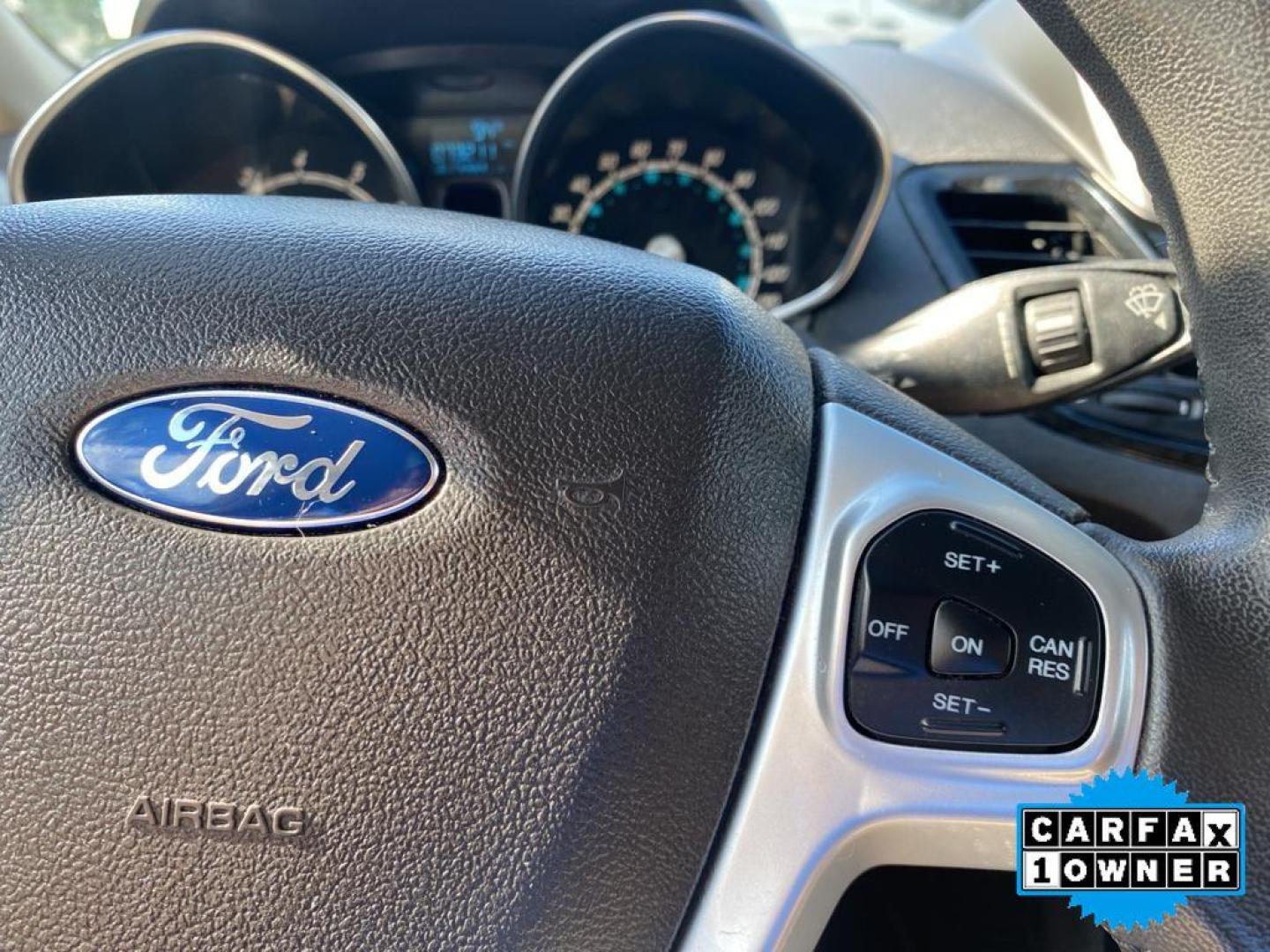 2014 Storm Gray Metallic /Charcoal Black w/Red Stitching Ford Fiesta SE (3FADP4EJ9EM) with an L4, 1.6L engine, 5-speed manual transmission, located at 3147 E Independence Blvd, Charlotte, NC, 28205, 35.200268, -80.773651 - <b>Equipment</b><br>This 2014 Ford Fiesta features a hands-free Bluetooth phone system. This vehicle is a certified CARFAX 1-owner. This vehicle has a L4, 1.6L high output engine. Front wheel drive on this 2014 Ford Fiesta gives you better traction and better fuel economy. Set the temperature exac - Photo#3