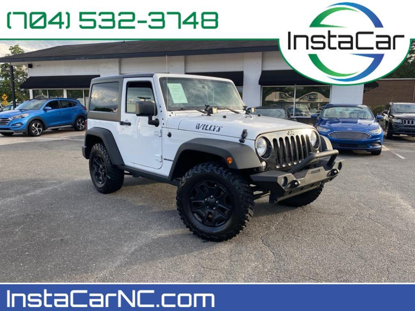 2017 Bright White Clearcoat /Black Jeep Wrangler Willys Wheeler (1C4AJWAG0HL) with an V6, 3.6L engine, 5-speed automatic transmission, located at 3147 E Independence Blvd, Charlotte, NC, 28205, 35.200268, -80.773651 - <b>Vehicle Details</b><br>Introducing the 2017 Jeep Wrangler Willys Wheeler, a robust and adventurous vehicle designed for the off-road enthusiast. Under the hood, this Wrangler boasts a powerful V6, 3.6L engine that delivers impressive performance both on and off the road. Equipped with 4WD, it ens - Photo#0