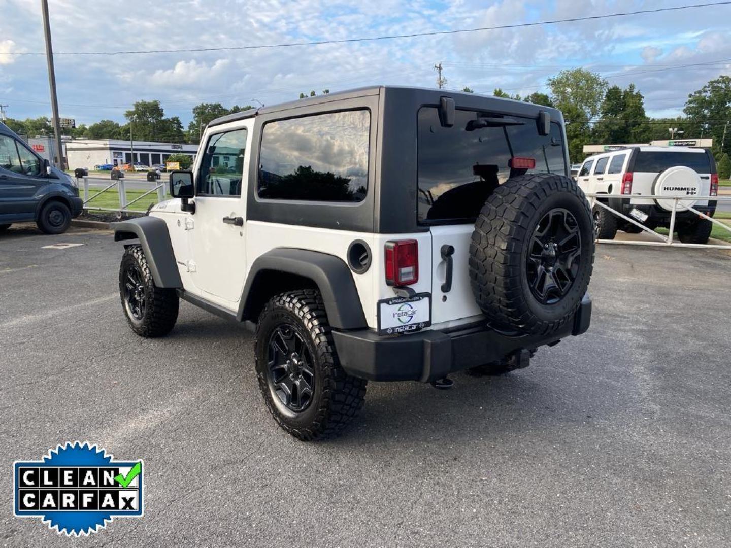 2017 Bright White Clearcoat /Black Jeep Wrangler Willys Wheeler (1C4AJWAG0HL) with an V6, 3.6L engine, 5-speed automatic transmission, located at 3147 E Independence Blvd, Charlotte, NC, 28205, 35.200268, -80.773651 - <b>Vehicle Details</b><br>Introducing the 2017 Jeep Wrangler Willys Wheeler, a robust and adventurous vehicle designed for the off-road enthusiast. Under the hood, this Wrangler boasts a powerful V6, 3.6L engine that delivers impressive performance both on and off the road. Equipped with 4WD, it ens - Photo#11