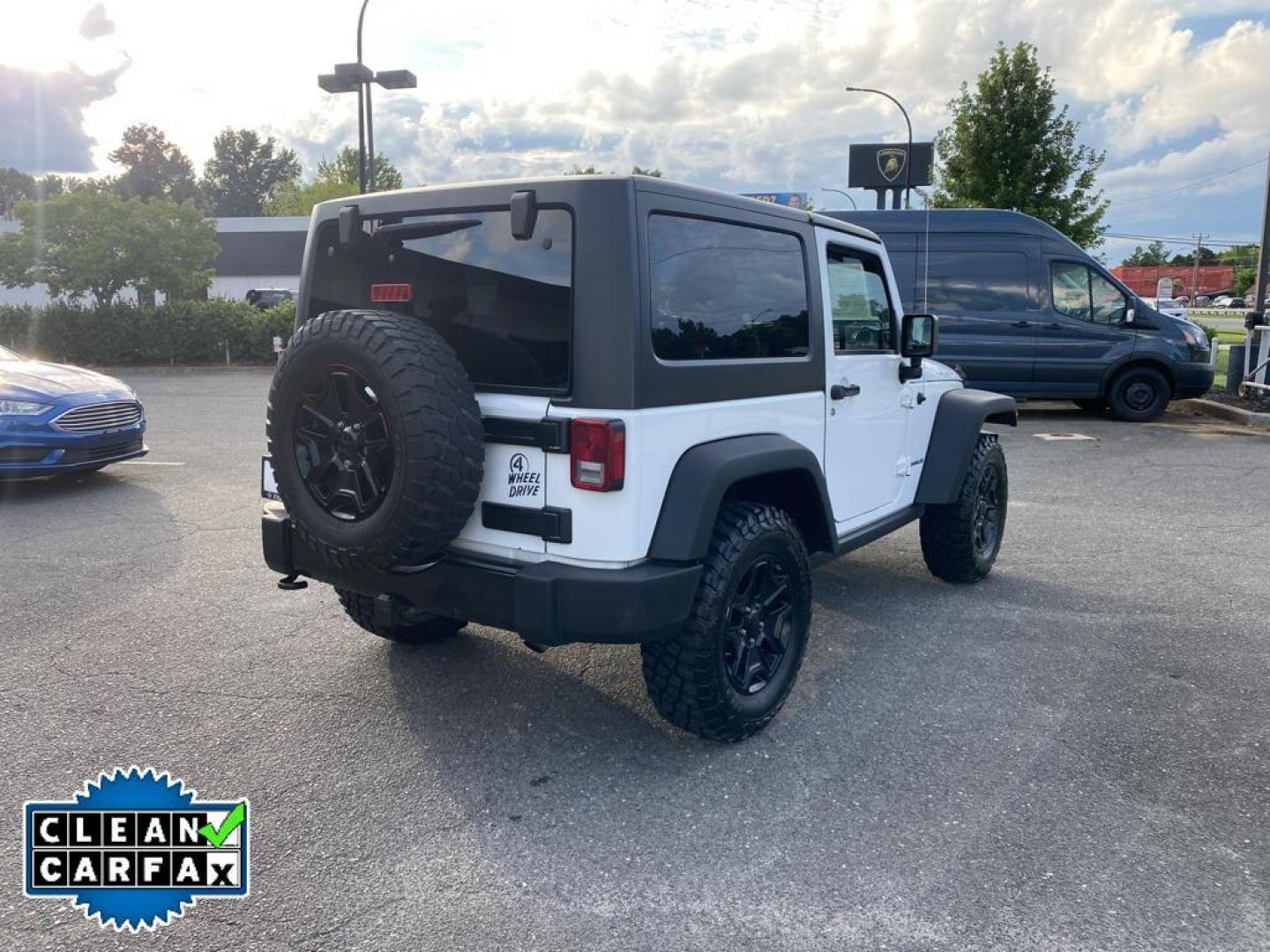 2017 Bright White Clearcoat /Black Jeep Wrangler Willys Wheeler (1C4AJWAG0HL) with an V6, 3.6L engine, 5-speed automatic transmission, located at 3147 E Independence Blvd, Charlotte, NC, 28205, 35.200268, -80.773651 - <b>Vehicle Details</b><br>Introducing the 2017 Jeep Wrangler Willys Wheeler, a robust and adventurous vehicle designed for the off-road enthusiast. Under the hood, this Wrangler boasts a powerful V6, 3.6L engine that delivers impressive performance both on and off the road. Equipped with 4WD, it ens - Photo#13