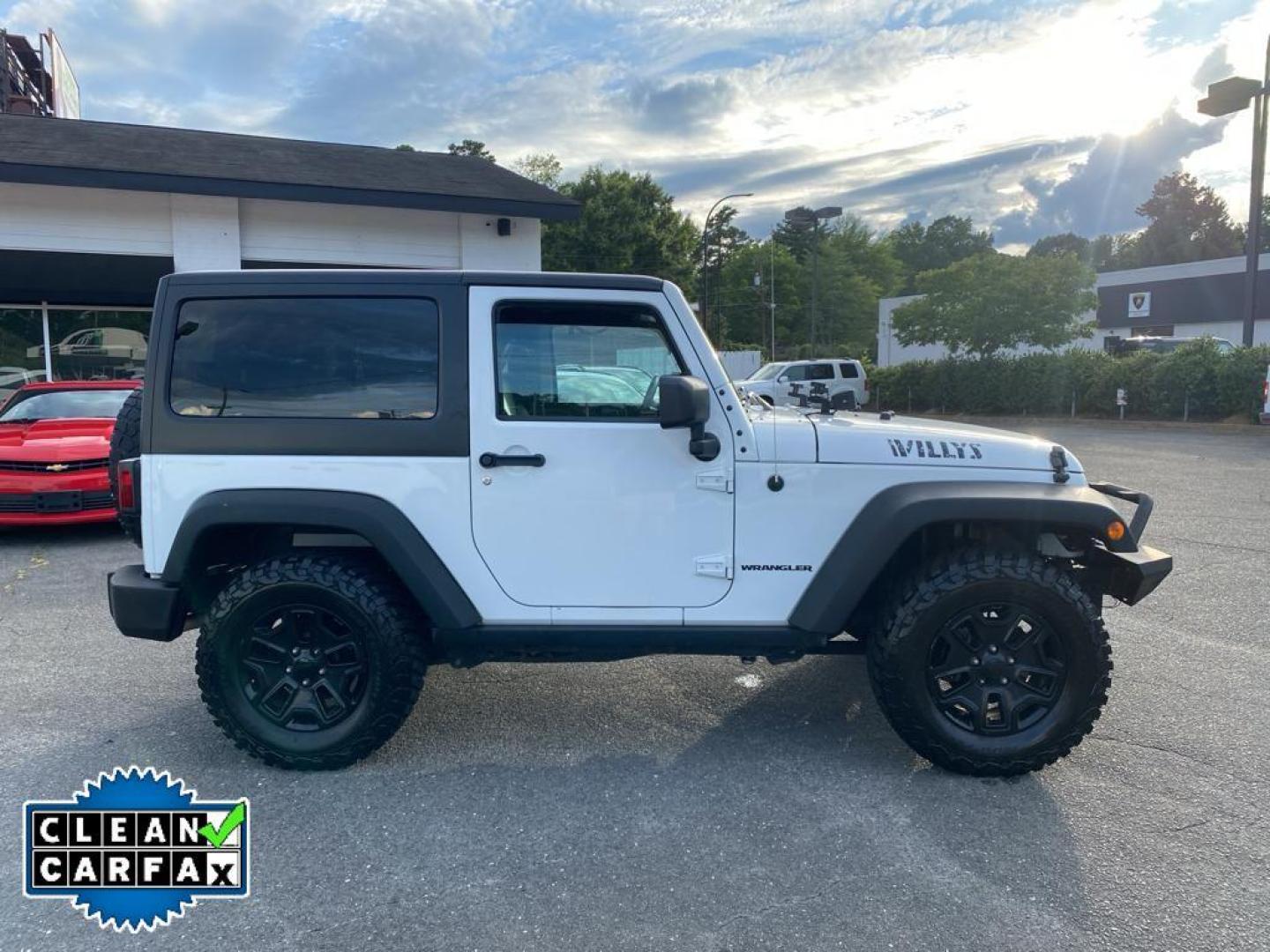 2017 Bright White Clearcoat /Black Jeep Wrangler Willys Wheeler (1C4AJWAG0HL) with an V6, 3.6L engine, 5-speed automatic transmission, located at 3147 E Independence Blvd, Charlotte, NC, 28205, 35.200268, -80.773651 - <b>Vehicle Details</b><br>Introducing the 2017 Jeep Wrangler Willys Wheeler, a robust and adventurous vehicle designed for the off-road enthusiast. Under the hood, this Wrangler boasts a powerful V6, 3.6L engine that delivers impressive performance both on and off the road. Equipped with 4WD, it ens - Photo#14