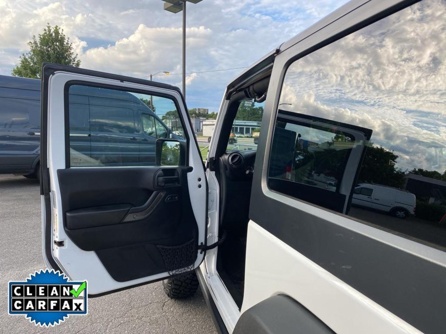 2017 Bright White Clearcoat /Black Jeep Wrangler Willys Wheeler (1C4AJWAG0HL) with an V6, 3.6L engine, 5-speed automatic transmission, located at 3147 E Independence Blvd, Charlotte, NC, 28205, 35.200268, -80.773651 - <b>Vehicle Details</b><br>Introducing the 2017 Jeep Wrangler Willys Wheeler, a robust and adventurous vehicle designed for the off-road enthusiast. Under the hood, this Wrangler boasts a powerful V6, 3.6L engine that delivers impressive performance both on and off the road. Equipped with 4WD, it ens - Photo#19