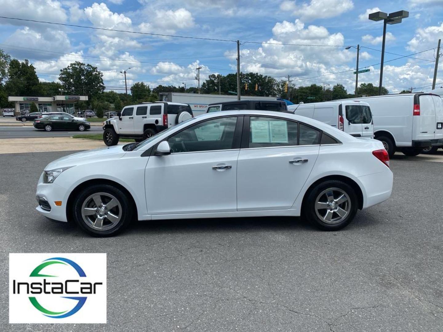 2016 Summit White /Jet Black Chevrolet Cruze Limited LT (1G1PE5SB5G7) with an L4, 1.4L engine, 6-speed automatic transmission, located at 3147 E Independence Blvd, Charlotte, NC, 28205, 35.200268, -80.773651 - Photo#9