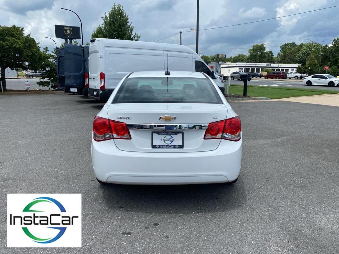 2016 Summit White /Jet Black Chevrolet Cruze Limited LT (1G1PE5SB5G7) with an L4, 1.4L engine, 6-speed automatic transmission, located at 3147 E Independence Blvd, Charlotte, NC, 28205, 35.200268, -80.773651 - Photo#11