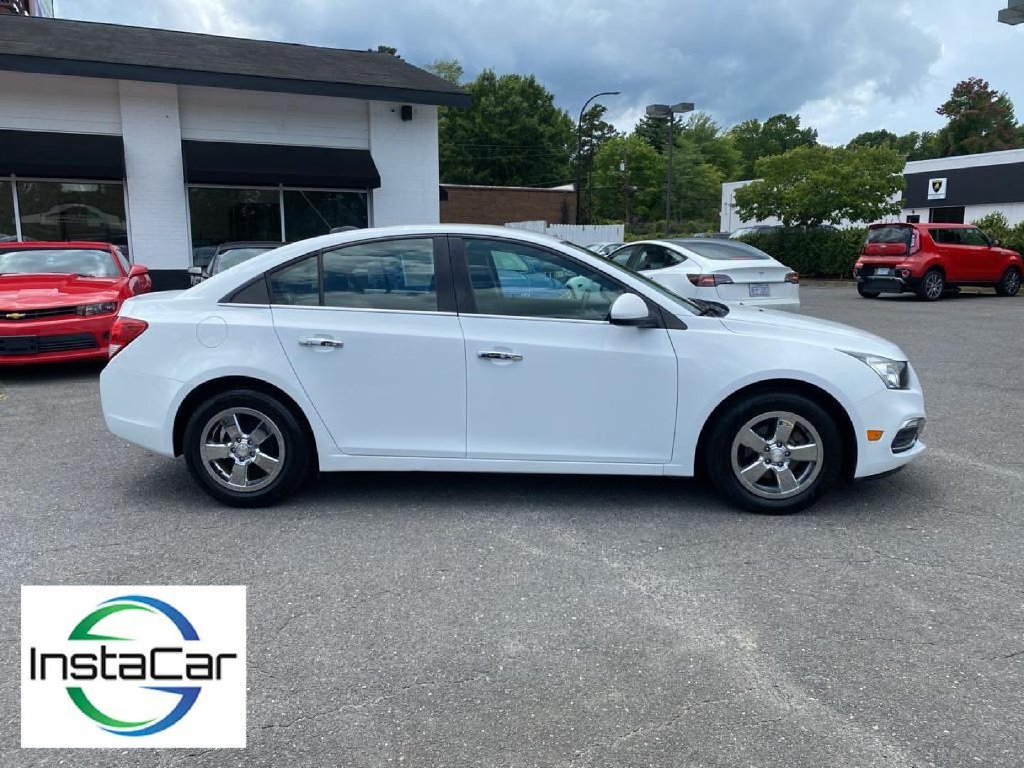 2016 Summit White /Jet Black Chevrolet Cruze Limited LT (1G1PE5SB5G7) with an L4, 1.4L engine, 6-speed automatic transmission, located at 3147 E Independence Blvd, Charlotte, NC, 28205, 35.200268, -80.773651 - Photo#13