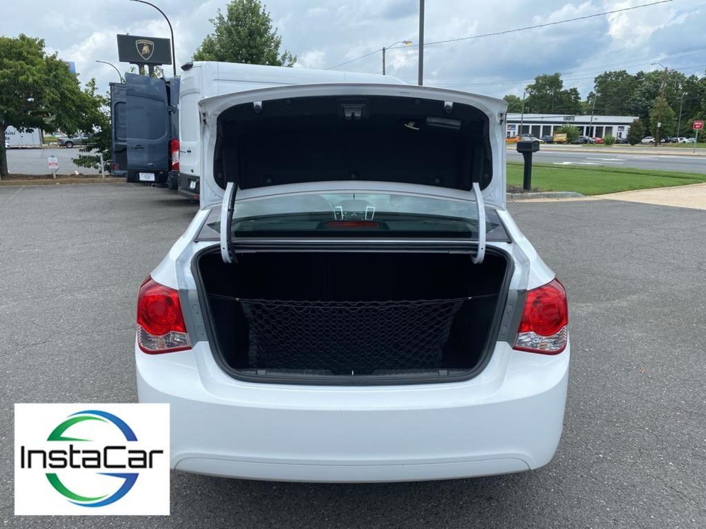 2016 Summit White /Jet Black Chevrolet Cruze Limited LT (1G1PE5SB5G7) with an L4, 1.4L engine, 6-speed automatic transmission, located at 3147 E Independence Blvd, Charlotte, NC, 28205, 35.200268, -80.773651 - Photo#29