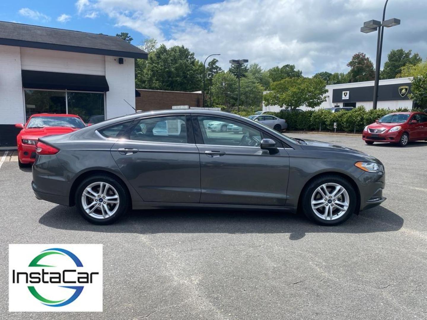 2018 Magnetic Metallic /Ebony Ford Fusion SE (3FA6P0H75JR) with an L4, 2.5L engine, 6-speed automatic transmission, located at 3147 E Independence Blvd, Charlotte, NC, 28205, 35.200268, -80.773651 - <b>Equipment</b><br>It is equipped with the latest generation of XM/Sirius Radio. Protect this 2018 Ford Fusion from unwanted accidents with a cutting edge backup camera system. This Ford Fusion features a hands-free Bluetooth phone system. The Ford Fusion has satellite radio capabilities. Set the - Photo#14