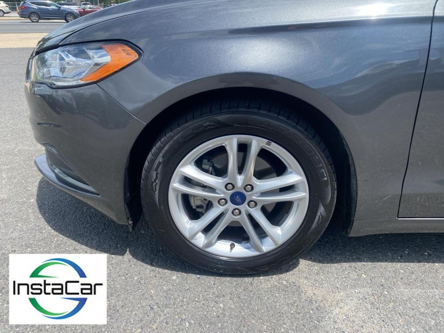 2018 Magnetic Metallic /Ebony Ford Fusion SE (3FA6P0H75JR) with an L4, 2.5L engine, 6-speed automatic transmission, located at 3147 E Independence Blvd, Charlotte, NC, 28205, 35.200268, -80.773651 - <b>Equipment</b><br>It is equipped with the latest generation of XM/Sirius Radio. Protect this 2018 Ford Fusion from unwanted accidents with a cutting edge backup camera system. This Ford Fusion features a hands-free Bluetooth phone system. The Ford Fusion has satellite radio capabilities. Set the - Photo#17