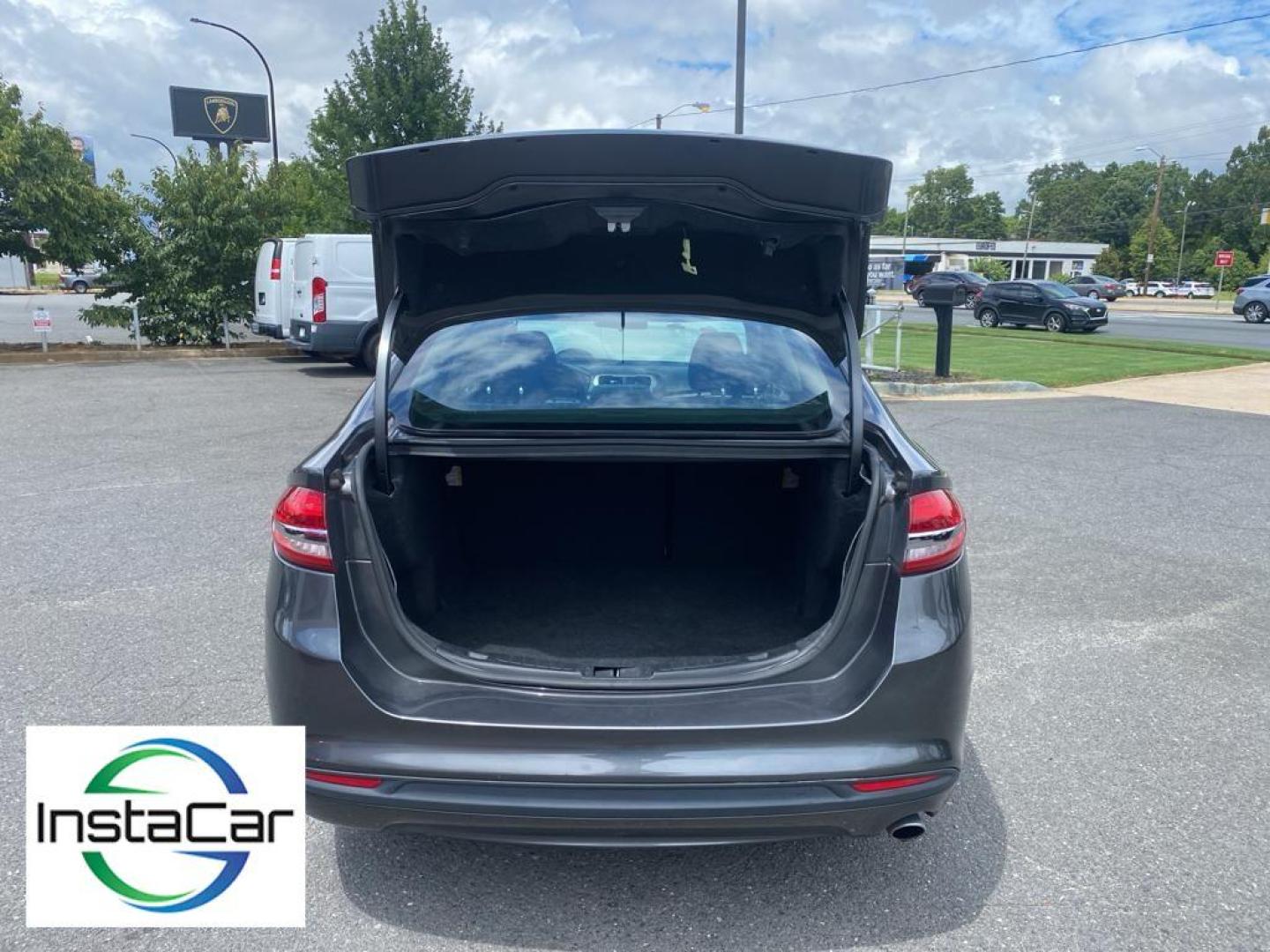 2018 Magnetic Metallic /Ebony Ford Fusion SE (3FA6P0H75JR) with an L4, 2.5L engine, 6-speed automatic transmission, located at 3147 E Independence Blvd, Charlotte, NC, 28205, 35.200268, -80.773651 - <b>Equipment</b><br>It is equipped with the latest generation of XM/Sirius Radio. Protect this 2018 Ford Fusion from unwanted accidents with a cutting edge backup camera system. This Ford Fusion features a hands-free Bluetooth phone system. The Ford Fusion has satellite radio capabilities. Set the - Photo#30