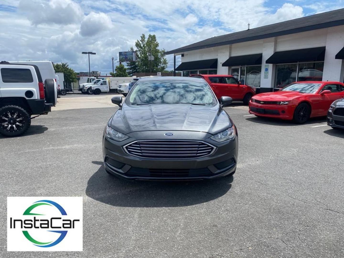 2018 Magnetic Metallic /Ebony Ford Fusion SE (3FA6P0H75JR) with an L4, 2.5L engine, 6-speed automatic transmission, located at 3147 E Independence Blvd, Charlotte, NC, 28205, 35.200268, -80.773651 - <b>Equipment</b><br>It is equipped with the latest generation of XM/Sirius Radio. Protect this 2018 Ford Fusion from unwanted accidents with a cutting edge backup camera system. This Ford Fusion features a hands-free Bluetooth phone system. The Ford Fusion has satellite radio capabilities. Set the - Photo#8