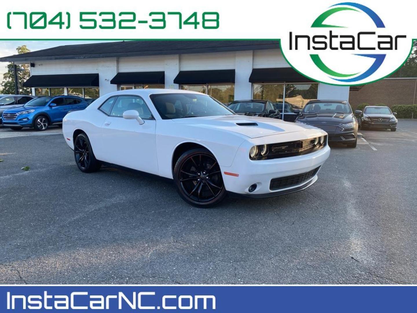 2016 WHITE Dodge Challenger SXT (2C3CDZAG5GH) with an V6, 3.6L engine, Automatic transmission, located at 3147 E Independence Blvd, Charlotte, NC, 28205, 35.200268, -80.773651 - <b>Equipment</b><br>Protect this 2016 Dodge Challenger from unwanted accidents with a cutting edge backup camera system. This unit features a hands-free Bluetooth phone system. The satellite radio system in this mid-size car gives you access to hundreds of nation-wide radio stations with a clear di - Photo#0