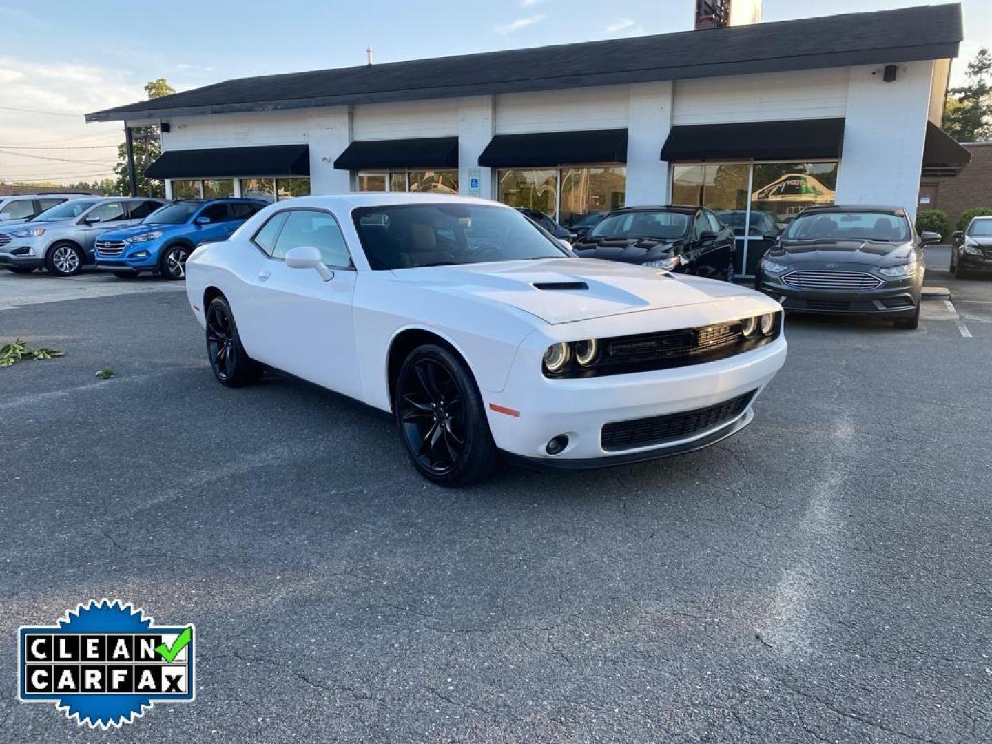 2016 WHITE Dodge Challenger SXT (2C3CDZAG5GH) with an V6, 3.6L engine, Automatic transmission, located at 3147 E Independence Blvd, Charlotte, NC, 28205, 35.200268, -80.773651 - <b>Equipment</b><br>Protect this 2016 Dodge Challenger from unwanted accidents with a cutting edge backup camera system. This unit features a hands-free Bluetooth phone system. The satellite radio system in this mid-size car gives you access to hundreds of nation-wide radio stations with a clear di - Photo#7