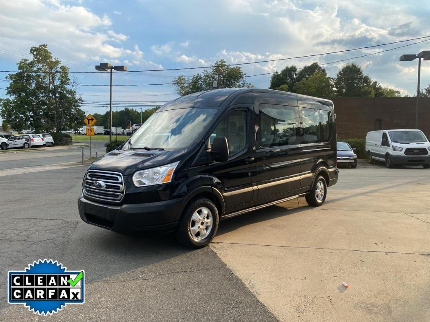 2019 Shadow Black /Pewter Ford Transit Wagon XLT (1FBAX2CM7KK) with an V6, 3.7L engine, 6-speed automatic transmission, located at 3147 E Independence Blvd, Charlotte, NC, 28205, 35.200268, -80.773651 - <b>Equipment</b><br>It features a hands-free Bluetooth phone system. Protect this 2019 Ford Transit Wagon T-350 Med Roof Slide from unwanted accidents with a cutting edge backup camera system. The vehicle has a clean CARFAX vehicle history report. With the keyless entry system on this unit you can p - Photo#10