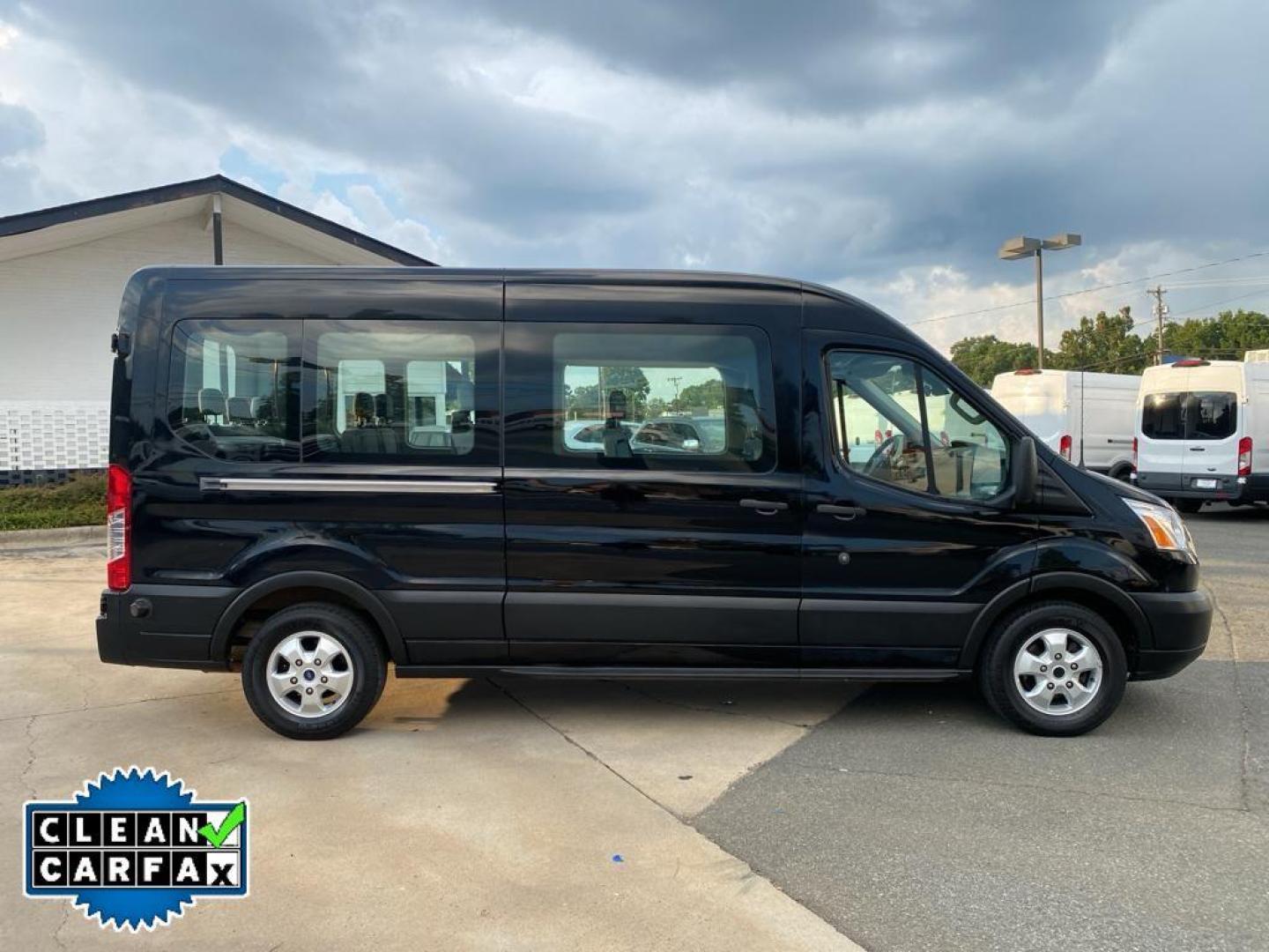 2019 Shadow Black /Pewter Ford Transit Wagon XLT (1FBAX2CM7KK) with an V6, 3.7L engine, 6-speed automatic transmission, located at 3147 E Independence Blvd, Charlotte, NC, 28205, 35.200268, -80.773651 - <b>Equipment</b><br>It features a hands-free Bluetooth phone system. Protect this 2019 Ford Transit Wagon T-350 Med Roof Slide from unwanted accidents with a cutting edge backup camera system. The vehicle has a clean CARFAX vehicle history report. With the keyless entry system on this unit you can p - Photo#15