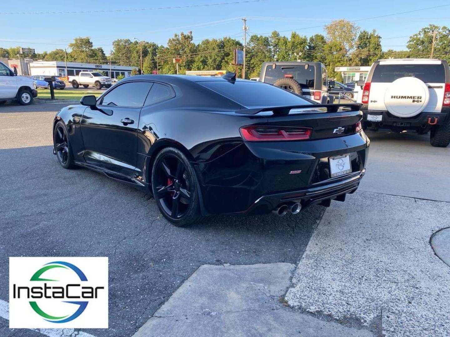 2017 black /Jet Black Chevrolet Camaro 2SS (1G1FH1R71H0) with an V8, 6.2L engine, 8-speed automatic transmission, located at 3147 E Independence Blvd, Charlotte, NC, 28205, 35.200268, -80.773651 - <b>Equipment</b><br>This vehicle has a premium sound system installed. Protect the vehicle from unwanted accidents with a cutting edge backup camera system. The HID headlamps on this vehicle light your way like never before. The rear parking assist technology on this Chevrolet Camaro will put you at - Photo#13