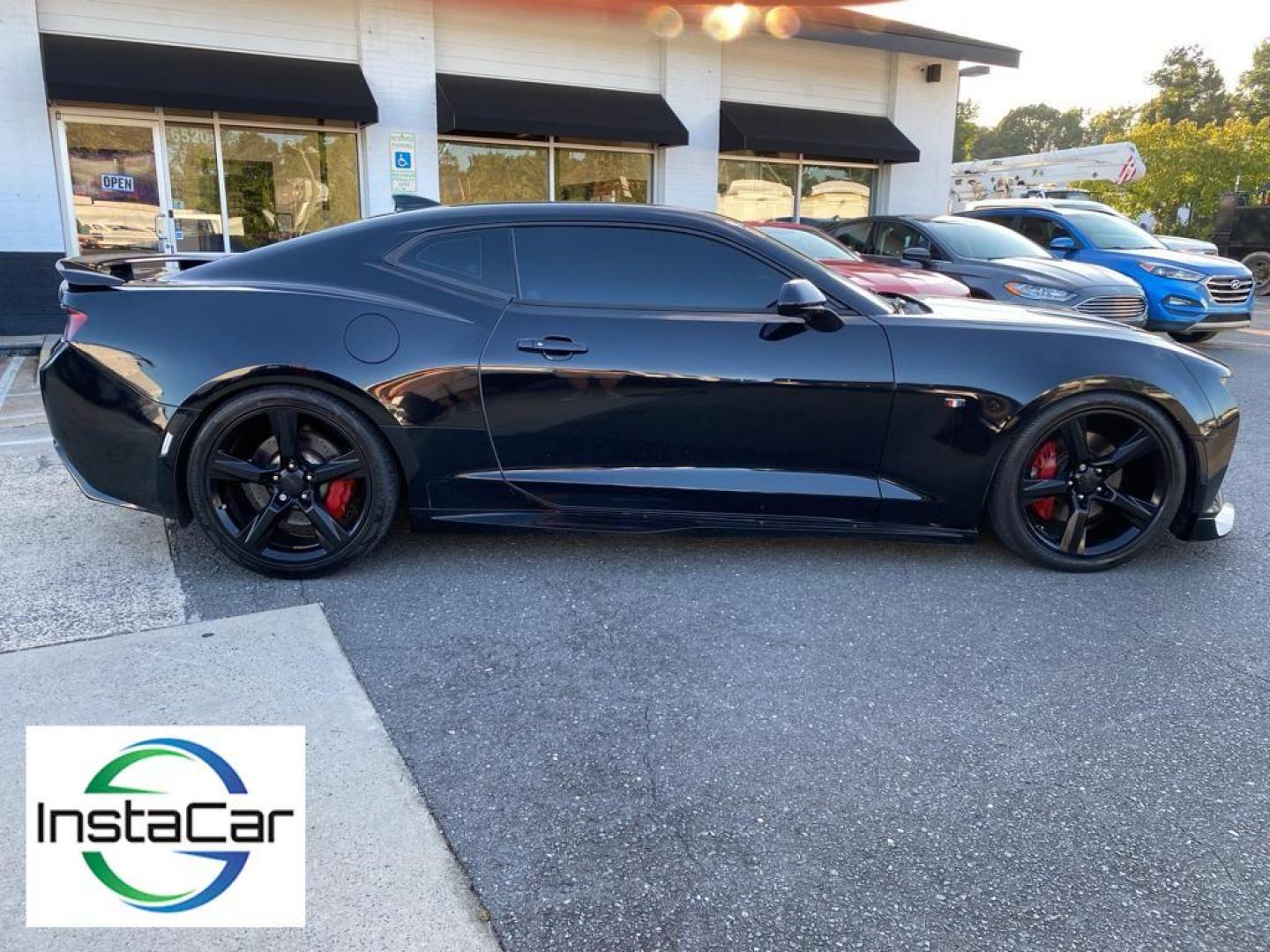 2017 black /Jet Black Chevrolet Camaro 2SS (1G1FH1R71H0) with an V8, 6.2L engine, 8-speed automatic transmission, located at 3147 E Independence Blvd, Charlotte, NC, 28205, 35.200268, -80.773651 - <b>Equipment</b><br>This vehicle has a premium sound system installed. Protect the vehicle from unwanted accidents with a cutting edge backup camera system. The HID headlamps on this vehicle light your way like never before. The rear parking assist technology on this Chevrolet Camaro will put you at - Photo#16