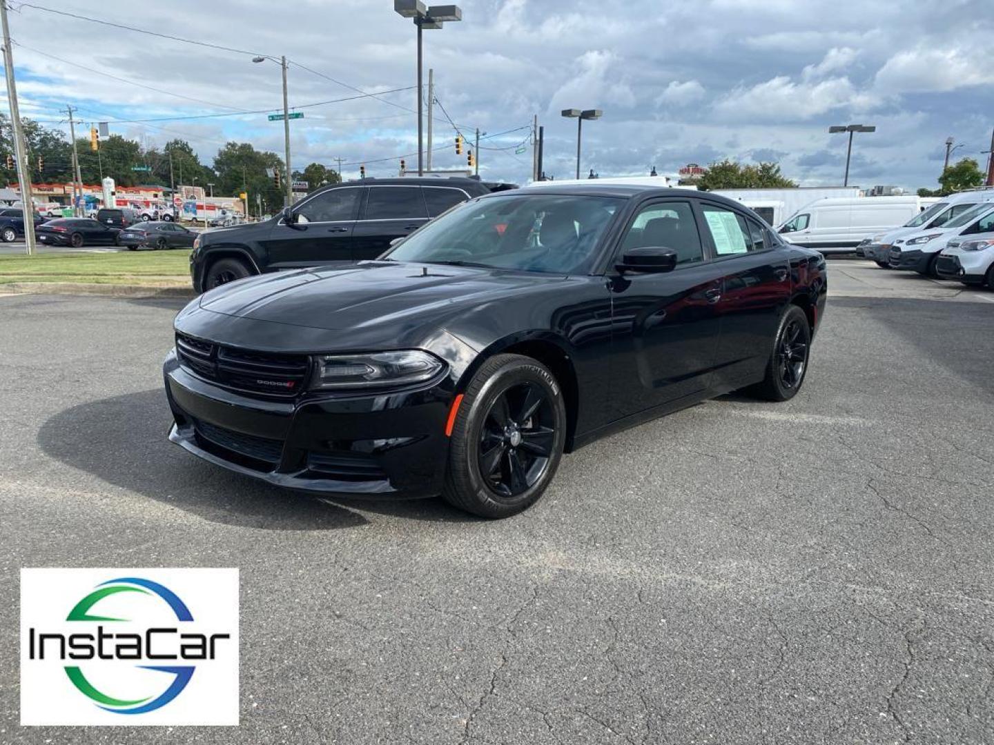 2019 Pitch Black Clearcoat /Black Dodge Charger SXT (2C3CDXBG8KH) with an V6, 3.6L engine, 8-speed automatic transmission, located at 3147 E Independence Blvd, Charlotte, NC, 28205, 35.200268, -80.773651 - Discover the thrill of driving with our pristine 2019 Dodge Charger SXT, now available at our dealership. This stylish and powerful sedan is equipped with a robust V6, 3.6L engine and Rear-Wheel Drive, delivering a dynamic and responsive driving experience that will elevate your daily commute or wee - Photo#10