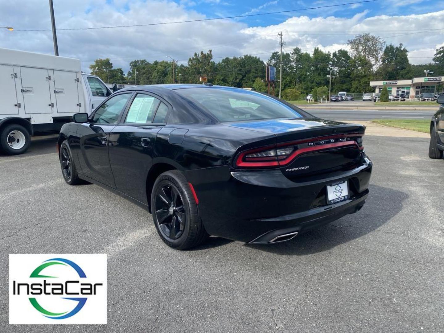 2019 Pitch Black Clearcoat /Black Dodge Charger SXT (2C3CDXBG8KH) with an V6, 3.6L engine, 8-speed automatic transmission, located at 3147 E Independence Blvd, Charlotte, NC, 28205, 35.200268, -80.773651 - Discover the thrill of driving with our pristine 2019 Dodge Charger SXT, now available at our dealership. This stylish and powerful sedan is equipped with a robust V6, 3.6L engine and Rear-Wheel Drive, delivering a dynamic and responsive driving experience that will elevate your daily commute or wee - Photo#12