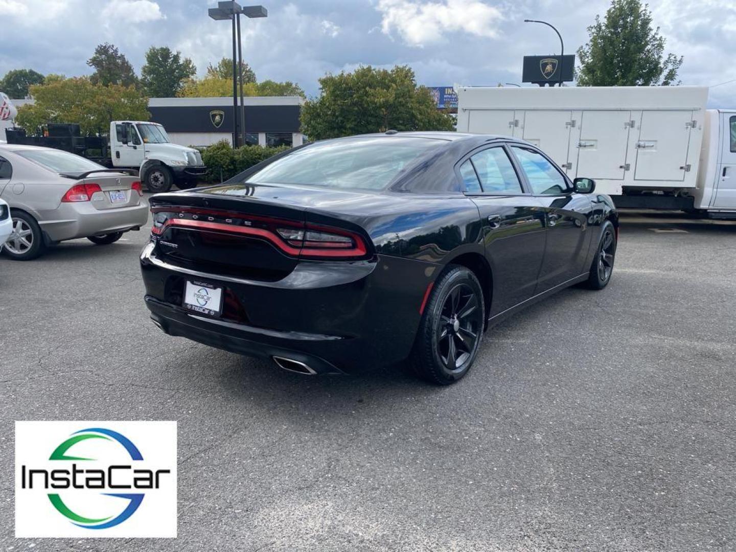 2019 Pitch Black Clearcoat /Black Dodge Charger SXT (2C3CDXBG8KH) with an V6, 3.6L engine, 8-speed automatic transmission, located at 3147 E Independence Blvd, Charlotte, NC, 28205, 35.200268, -80.773651 - Discover the thrill of driving with our pristine 2019 Dodge Charger SXT, now available at our dealership. This stylish and powerful sedan is equipped with a robust V6, 3.6L engine and Rear-Wheel Drive, delivering a dynamic and responsive driving experience that will elevate your daily commute or wee - Photo#14