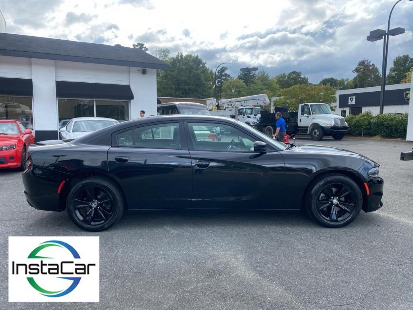 2019 Pitch Black Clearcoat /Black Dodge Charger SXT (2C3CDXBG8KH) with an V6, 3.6L engine, 8-speed automatic transmission, located at 3147 E Independence Blvd, Charlotte, NC, 28205, 35.200268, -80.773651 - Discover the thrill of driving with our pristine 2019 Dodge Charger SXT, now available at our dealership. This stylish and powerful sedan is equipped with a robust V6, 3.6L engine and Rear-Wheel Drive, delivering a dynamic and responsive driving experience that will elevate your daily commute or wee - Photo#15