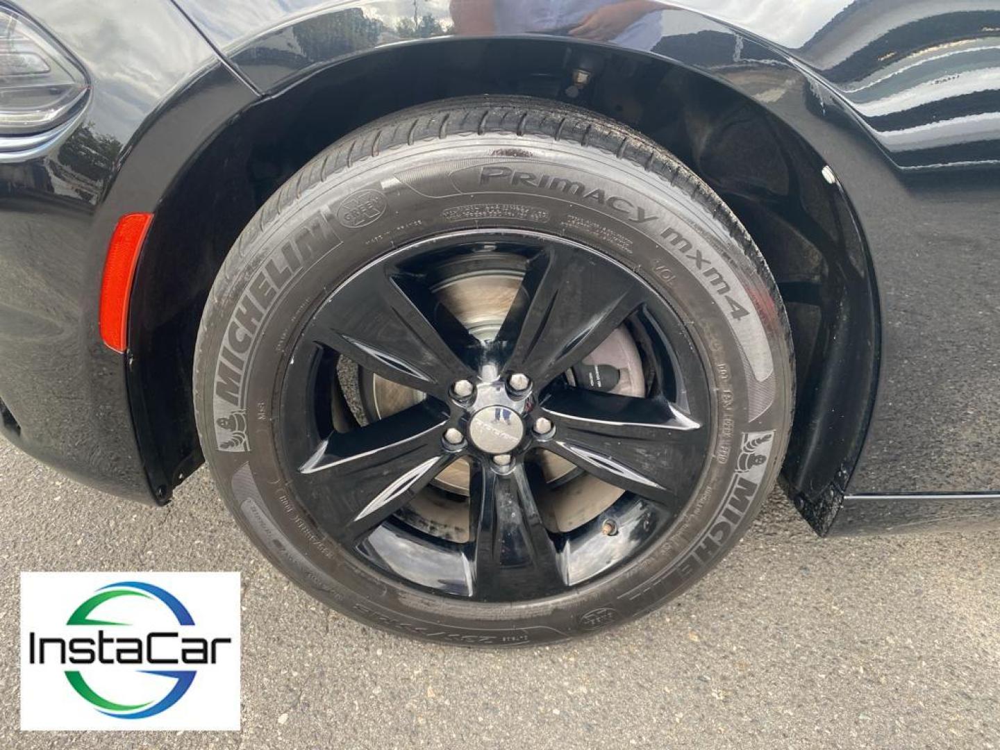 2019 Pitch Black Clearcoat /Black Dodge Charger SXT (2C3CDXBG8KH) with an V6, 3.6L engine, 8-speed automatic transmission, located at 3147 E Independence Blvd, Charlotte, NC, 28205, 35.200268, -80.773651 - Discover the thrill of driving with our pristine 2019 Dodge Charger SXT, now available at our dealership. This stylish and powerful sedan is equipped with a robust V6, 3.6L engine and Rear-Wheel Drive, delivering a dynamic and responsive driving experience that will elevate your daily commute or wee - Photo#18