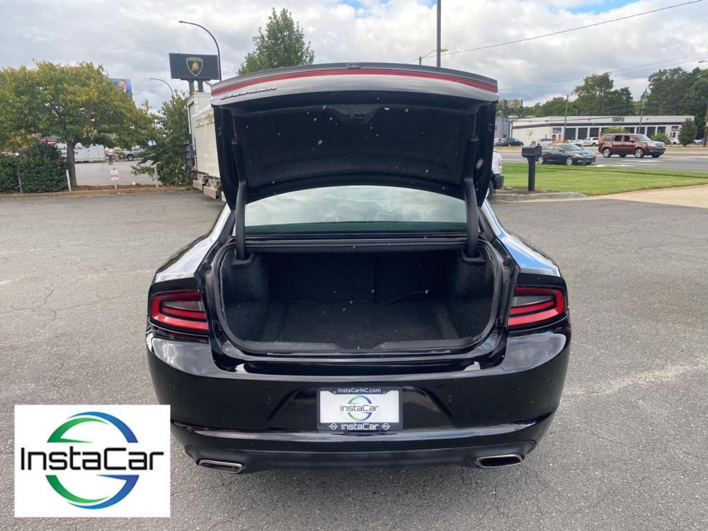 2019 Pitch Black Clearcoat /Black Dodge Charger SXT (2C3CDXBG8KH) with an V6, 3.6L engine, 8-speed automatic transmission, located at 3147 E Independence Blvd, Charlotte, NC, 28205, 35.200268, -80.773651 - Discover the thrill of driving with our pristine 2019 Dodge Charger SXT, now available at our dealership. This stylish and powerful sedan is equipped with a robust V6, 3.6L engine and Rear-Wheel Drive, delivering a dynamic and responsive driving experience that will elevate your daily commute or wee - Photo#31