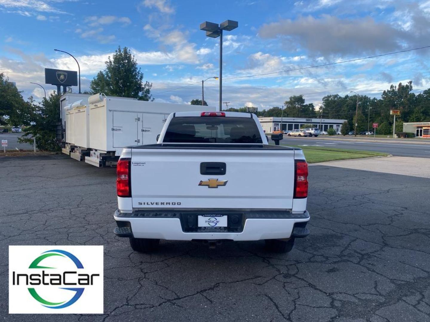 2018 Summit White /Dark Ash/Jet Black Chevrolet Silverado Custom (1GCVKPEC3JZ) with an V8, 5.3L engine, 6-speed automatic transmission, located at 3147 E Independence Blvd, Charlotte, NC, 28205, 35.200268, -80.773651 - <b>Equipment</b><br>This Chevrolet Silverado will allow to see the road and so much more with the HID headlights. The premium wheels make this model stand out from the crowd. Bluetooth technology is built into this vehicle, keeping your hands on the steering wheel and your focus on the road. The sat - Photo#11