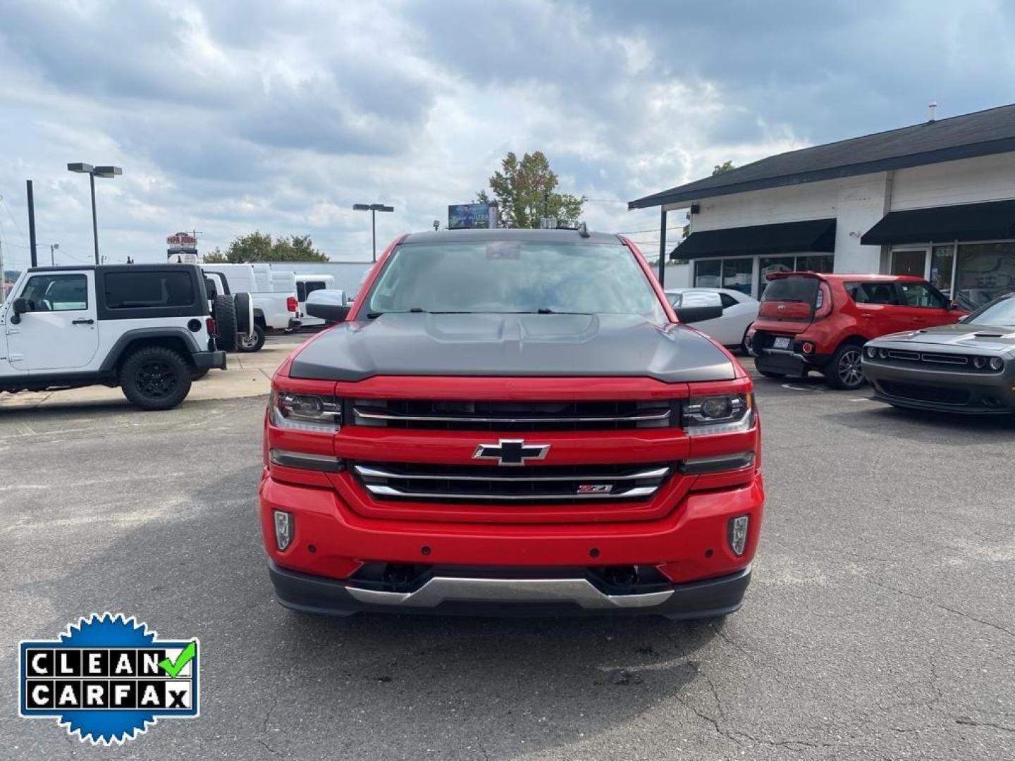 2016 Red Hot /Jet Black Chevrolet Silverado LTZ (3GCUKSECXGG) with an V8, 5.3L engine, 8-speed automatic transmission, located at 3147 E Independence Blvd, Charlotte, NC, 28205, 35.200268, -80.773651 - <b>Equipment</b><br>This vehicle features a hands-free Bluetooth phone system. The rear parking assist technology on this 1/2 ton pickup will put you at ease when reversing. The system alerts you as you get closer to an obstruction. This 1/2 ton pickup stays safely in its lane with Lane Keep Assist - Photo#9