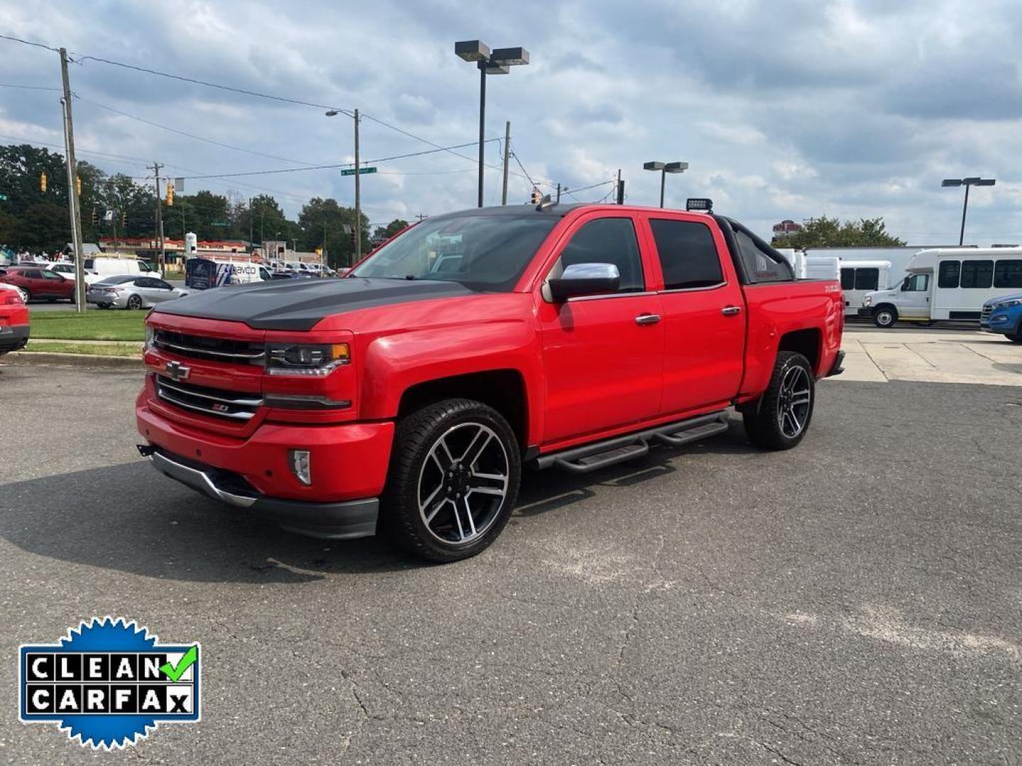 2016 Red Hot /Jet Black Chevrolet Silverado LTZ (3GCUKSECXGG) with an V8, 5.3L engine, 8-speed automatic transmission, located at 3147 E Independence Blvd, Charlotte, NC, 28205, 35.200268, -80.773651 - <b>Equipment</b><br>This vehicle features a hands-free Bluetooth phone system. The rear parking assist technology on this 1/2 ton pickup will put you at ease when reversing. The system alerts you as you get closer to an obstruction. This 1/2 ton pickup stays safely in its lane with Lane Keep Assist - Photo#10