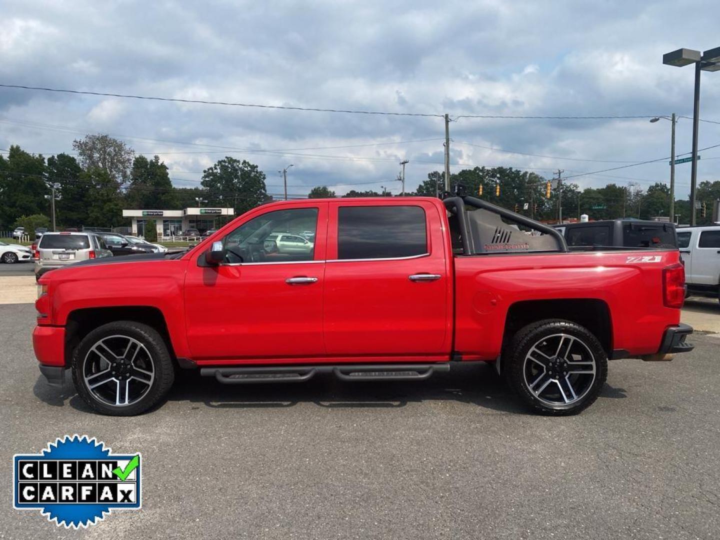 2016 Red Hot /Jet Black Chevrolet Silverado LTZ (3GCUKSECXGG) with an V8, 5.3L engine, 8-speed automatic transmission, located at 3147 E Independence Blvd, Charlotte, NC, 28205, 35.200268, -80.773651 - <b>Equipment</b><br>This vehicle features a hands-free Bluetooth phone system. The rear parking assist technology on this 1/2 ton pickup will put you at ease when reversing. The system alerts you as you get closer to an obstruction. This 1/2 ton pickup stays safely in its lane with Lane Keep Assist - Photo#11