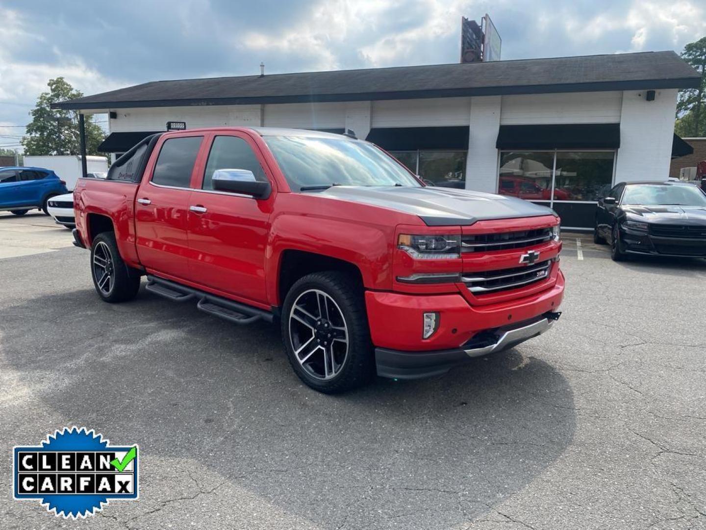 2016 Red Hot /Jet Black Chevrolet Silverado LTZ (3GCUKSECXGG) with an V8, 5.3L engine, 8-speed automatic transmission, located at 3147 E Independence Blvd, Charlotte, NC, 28205, 35.200268, -80.773651 - <b>Equipment</b><br>This vehicle features a hands-free Bluetooth phone system. The rear parking assist technology on this 1/2 ton pickup will put you at ease when reversing. The system alerts you as you get closer to an obstruction. This 1/2 ton pickup stays safely in its lane with Lane Keep Assist - Photo#8