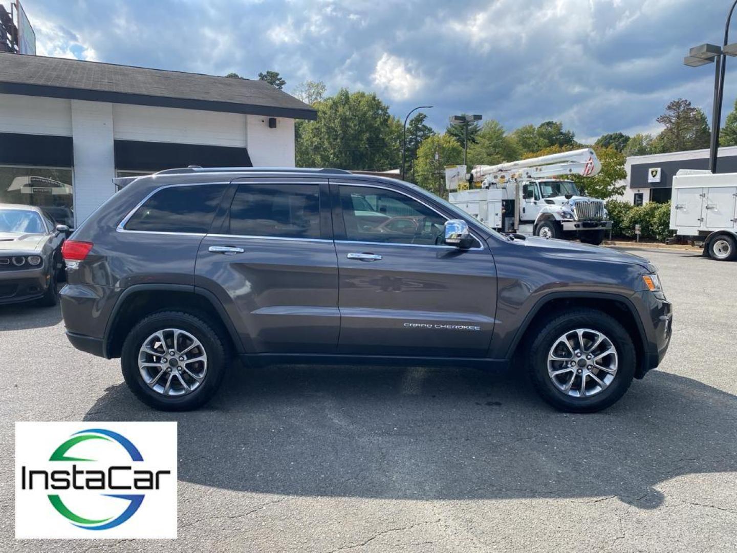 2015 Granite Crystal Metallic Clearcoat /Black Jeep Grand Cherokee Limited (1C4RJEBG5FC) with an V6, 3.6L engine, 8-speed automatic transmission, located at 3147 E Independence Blvd, Charlotte, NC, 28205, 35.200268, -80.773651 - Discover exceptional comfort and performance with this 2015 Jeep Grand Cherokee Limited. This well-maintained SUV comes equipped with a robust V6, 3.6L engine paired with rear-wheel drive, offering a dynamic and smooth driving experience. <br><br>The interior is designed to impress with premium leat - Photo#13