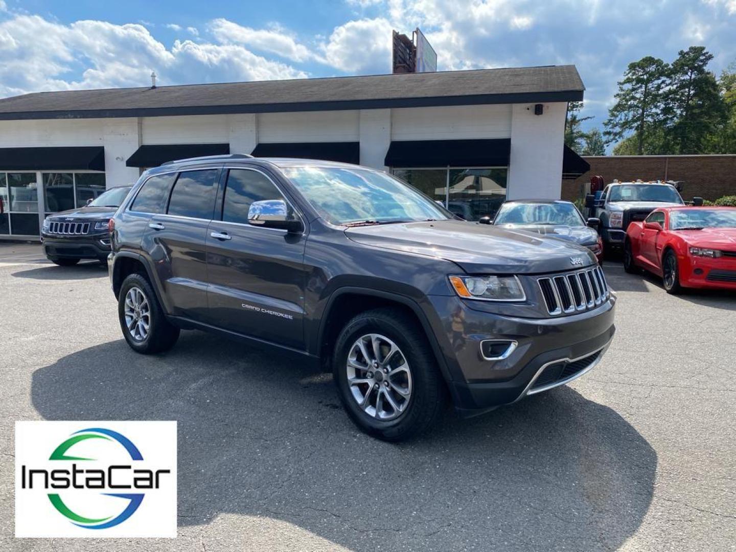 2015 Granite Crystal Metallic Clearcoat /Black Jeep Grand Cherokee Limited (1C4RJEBG5FC) with an V6, 3.6L engine, 8-speed automatic transmission, located at 3147 E Independence Blvd, Charlotte, NC, 28205, 35.200268, -80.773651 - Discover exceptional comfort and performance with this 2015 Jeep Grand Cherokee Limited. This well-maintained SUV comes equipped with a robust V6, 3.6L engine paired with rear-wheel drive, offering a dynamic and smooth driving experience. <br><br>The interior is designed to impress with premium leat - Photo#6