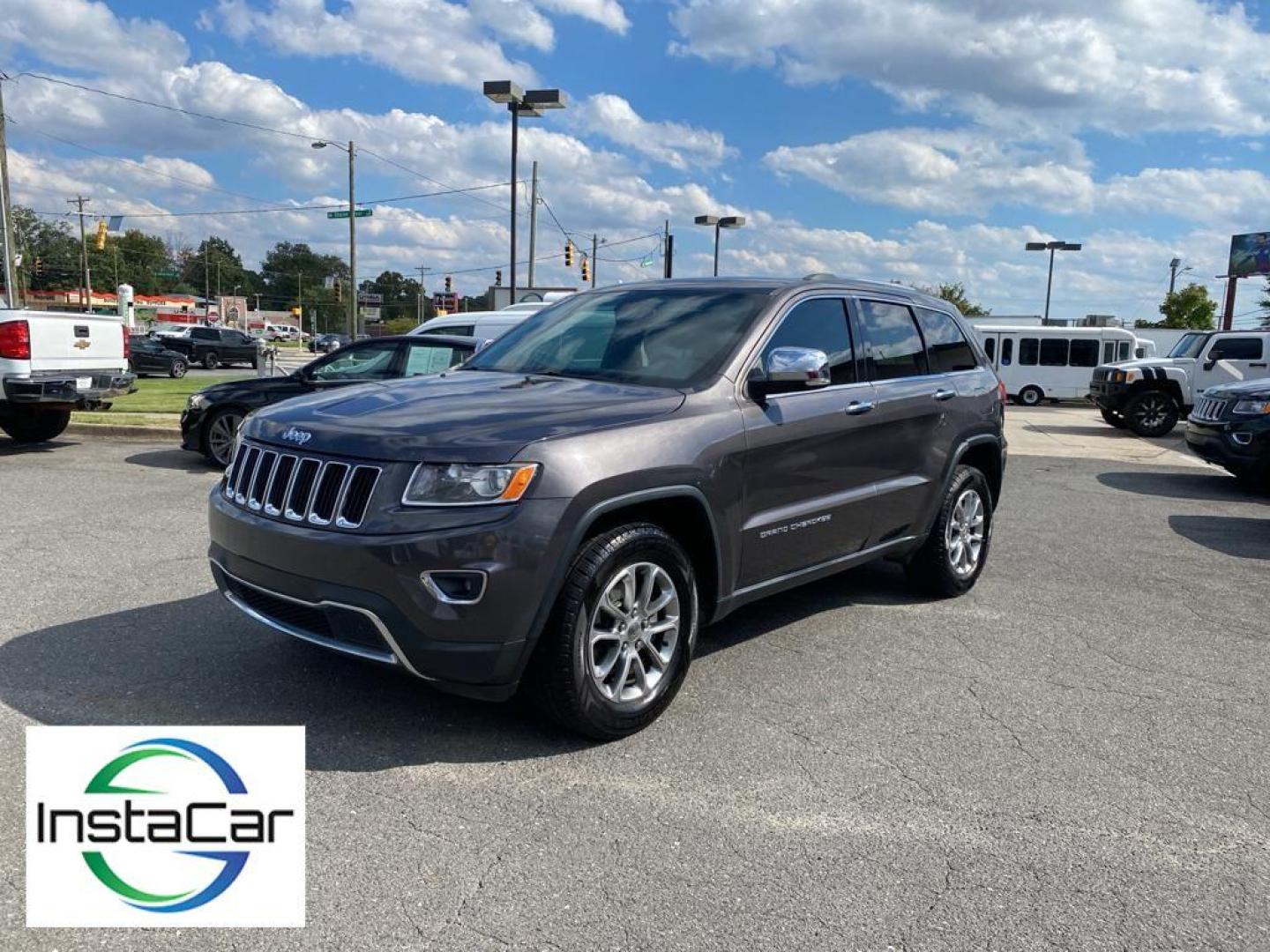 2015 Granite Crystal Metallic Clearcoat /Black Jeep Grand Cherokee Limited (1C4RJEBG5FC) with an V6, 3.6L engine, 8-speed automatic transmission, located at 3147 E Independence Blvd, Charlotte, NC, 28205, 35.200268, -80.773651 - Discover exceptional comfort and performance with this 2015 Jeep Grand Cherokee Limited. This well-maintained SUV comes equipped with a robust V6, 3.6L engine paired with rear-wheel drive, offering a dynamic and smooth driving experience. <br><br>The interior is designed to impress with premium leat - Photo#8