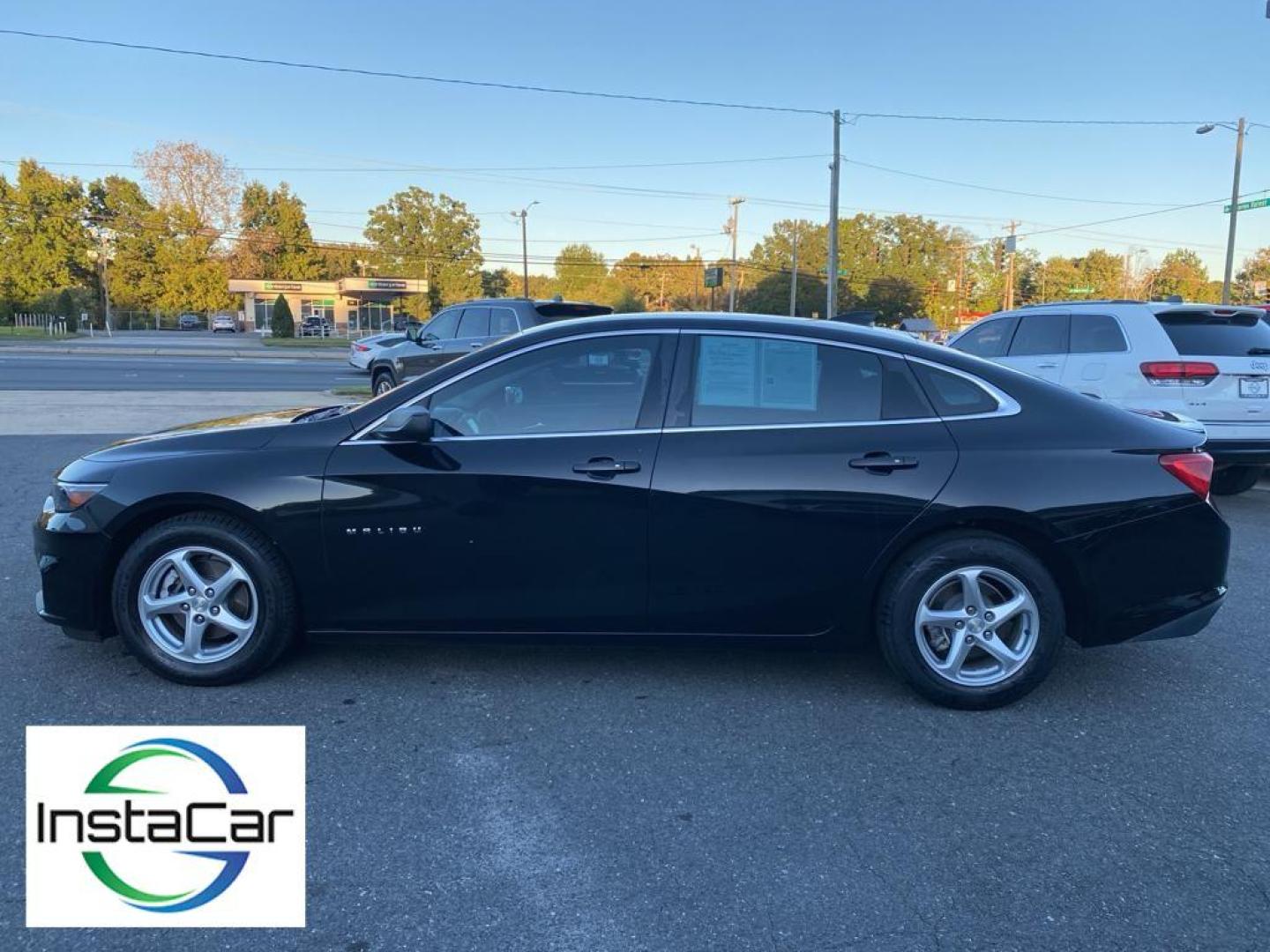 2016 Mosaic Black Metallic /Jet Black Chevrolet Malibu LS (1G1ZB5ST4GF) with an L4, 1.5L engine, 6-speed automatic transmission, located at 3147 E Independence Blvd, Charlotte, NC, 28205, 35.200268, -80.773651 - Get ready to experience the perfect blend of performance, style, and technology with this stunning 2016 Chevrolet Malibu LS (1LS)! This sleek and sophisticated sedan is designed to captivate and impress from every angle. Featuring a robust L4, 1.5L engine, the Malibu delivers a smooth and responsive - Photo#9