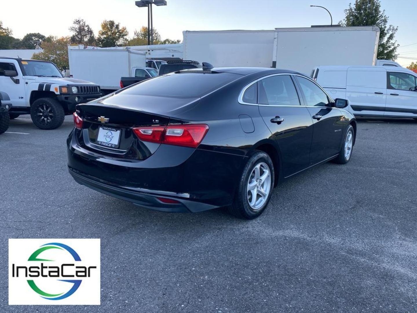 2016 Mosaic Black Metallic /Jet Black Chevrolet Malibu LS (1G1ZB5ST4GF) with an L4, 1.5L engine, 6-speed automatic transmission, located at 3147 E Independence Blvd, Charlotte, NC, 28205, 35.200268, -80.773651 - Get ready to experience the perfect blend of performance, style, and technology with this stunning 2016 Chevrolet Malibu LS (1LS)! This sleek and sophisticated sedan is designed to captivate and impress from every angle. Featuring a robust L4, 1.5L engine, the Malibu delivers a smooth and responsive - Photo#12