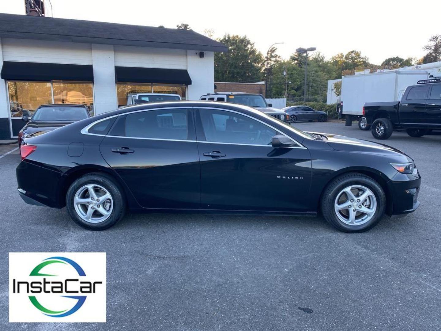 2016 Mosaic Black Metallic /Jet Black Chevrolet Malibu LS (1G1ZB5ST4GF) with an L4, 1.5L engine, 6-speed automatic transmission, located at 3147 E Independence Blvd, Charlotte, NC, 28205, 35.200268, -80.773651 - Get ready to experience the perfect blend of performance, style, and technology with this stunning 2016 Chevrolet Malibu LS (1LS)! This sleek and sophisticated sedan is designed to captivate and impress from every angle. Featuring a robust L4, 1.5L engine, the Malibu delivers a smooth and responsive - Photo#13