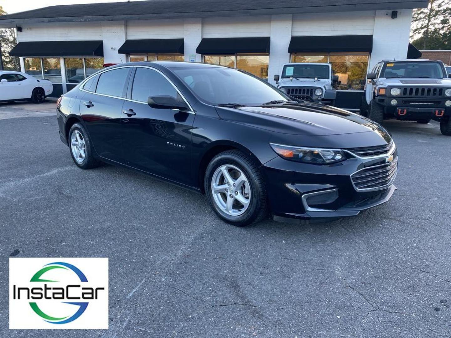 2016 Mosaic Black Metallic /Jet Black Chevrolet Malibu LS (1G1ZB5ST4GF) with an L4, 1.5L engine, 6-speed automatic transmission, located at 3147 E Independence Blvd, Charlotte, NC, 28205, 35.200268, -80.773651 - Get ready to experience the perfect blend of performance, style, and technology with this stunning 2016 Chevrolet Malibu LS (1LS)! This sleek and sophisticated sedan is designed to captivate and impress from every angle. Featuring a robust L4, 1.5L engine, the Malibu delivers a smooth and responsive - Photo#6