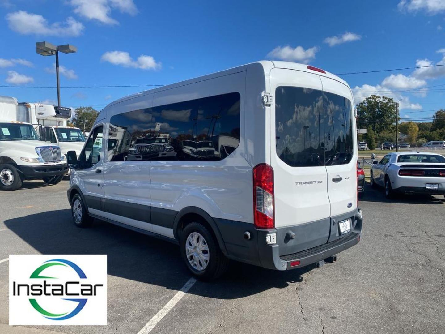 2017 WHITE Ford Transit Wagon (1FBAX2CM4HK) with an V6, 3.7L engine, Automatic transmission, located at 3147 E Independence Blvd, Charlotte, NC, 28205, 35.200268, -80.773651 - Get ready to elevate your driving and passenger experience with this remarkable 2017 Ford Transit Wagon T-350! This versatile powerhouse is the ideal choice for anyone seeking reliability, space, and modern convenience. Sporting a robust V6, 3.7L engine paired with Rear-Wheel Drive, this Transit Wag - Photo#12