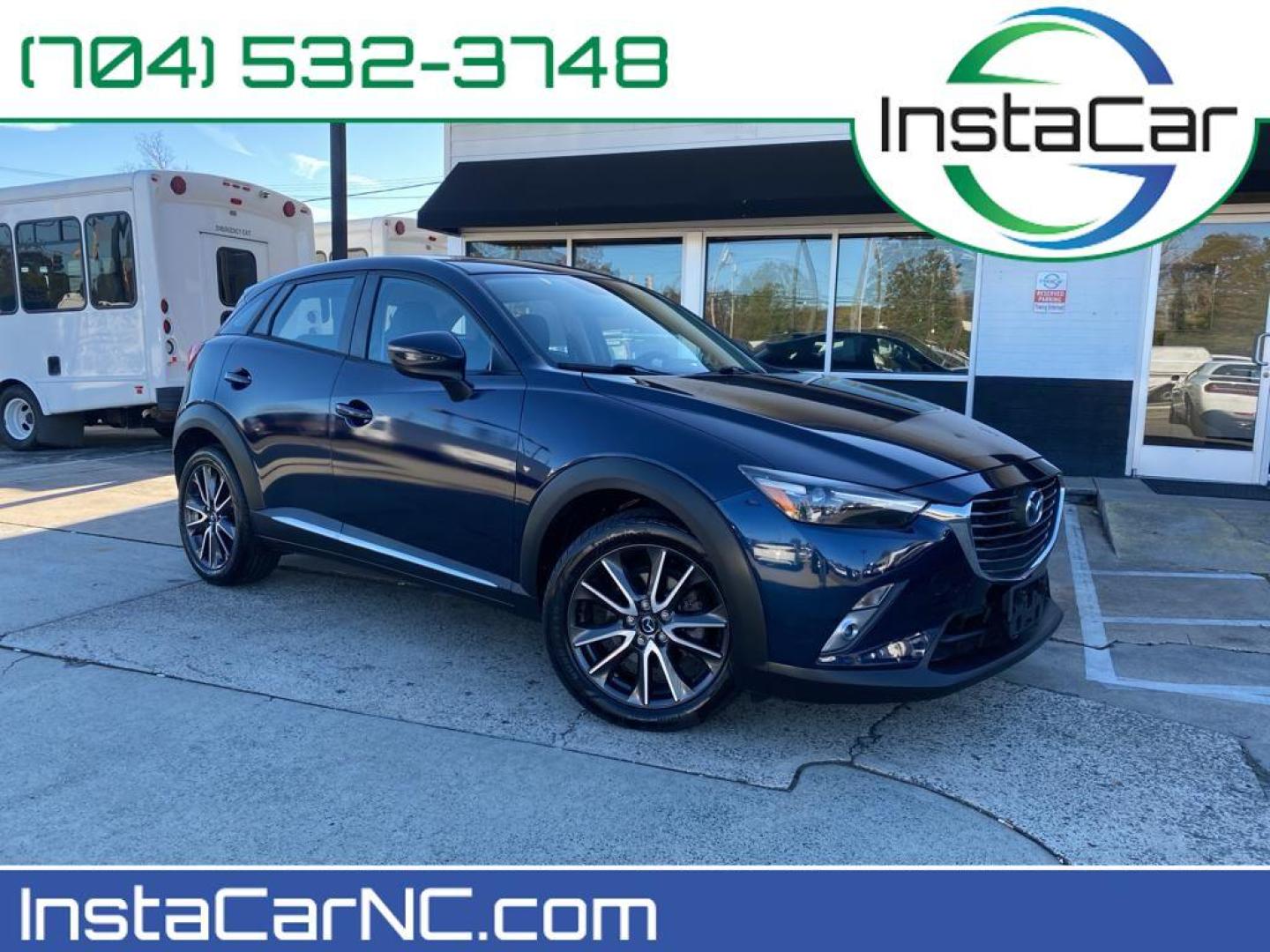 2017 Deep Crystal Blue Mica /Black Mazda CX-3 Grand Touring (JM1DKFD77H0) with an 4 Cyl, 2.0L engine, 6-speed automatic transmission, located at 3147 E Independence Blvd, Charlotte, NC, 28205, 35.200268, -80.773651 - Photo#0