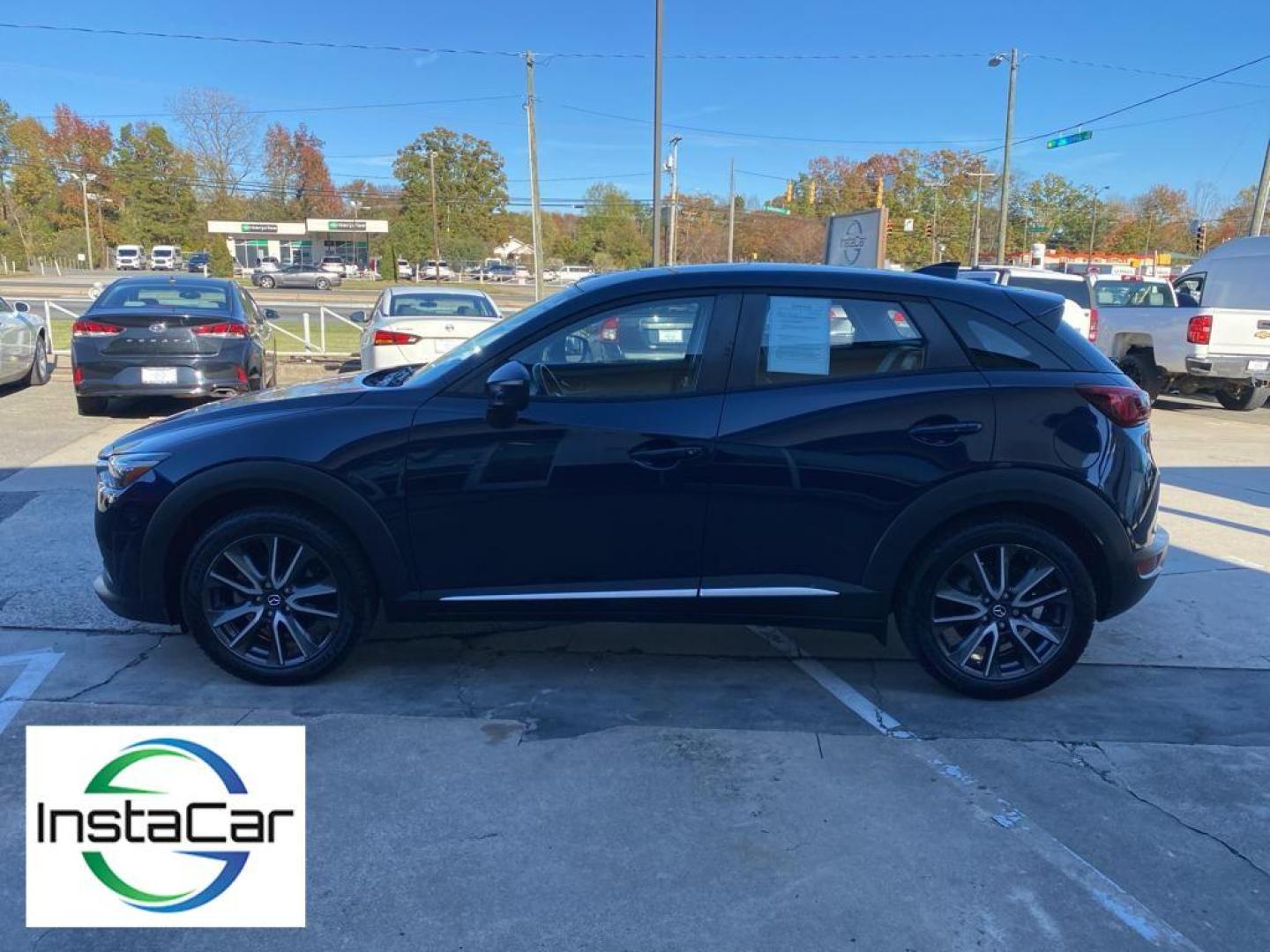 2017 Deep Crystal Blue Mica /Black Mazda CX-3 Grand Touring (JM1DKFD77H0) with an 4 Cyl, 2.0L engine, 6-speed automatic transmission, located at 3147 E Independence Blvd, Charlotte, NC, 28205, 35.200268, -80.773651 - Photo#10