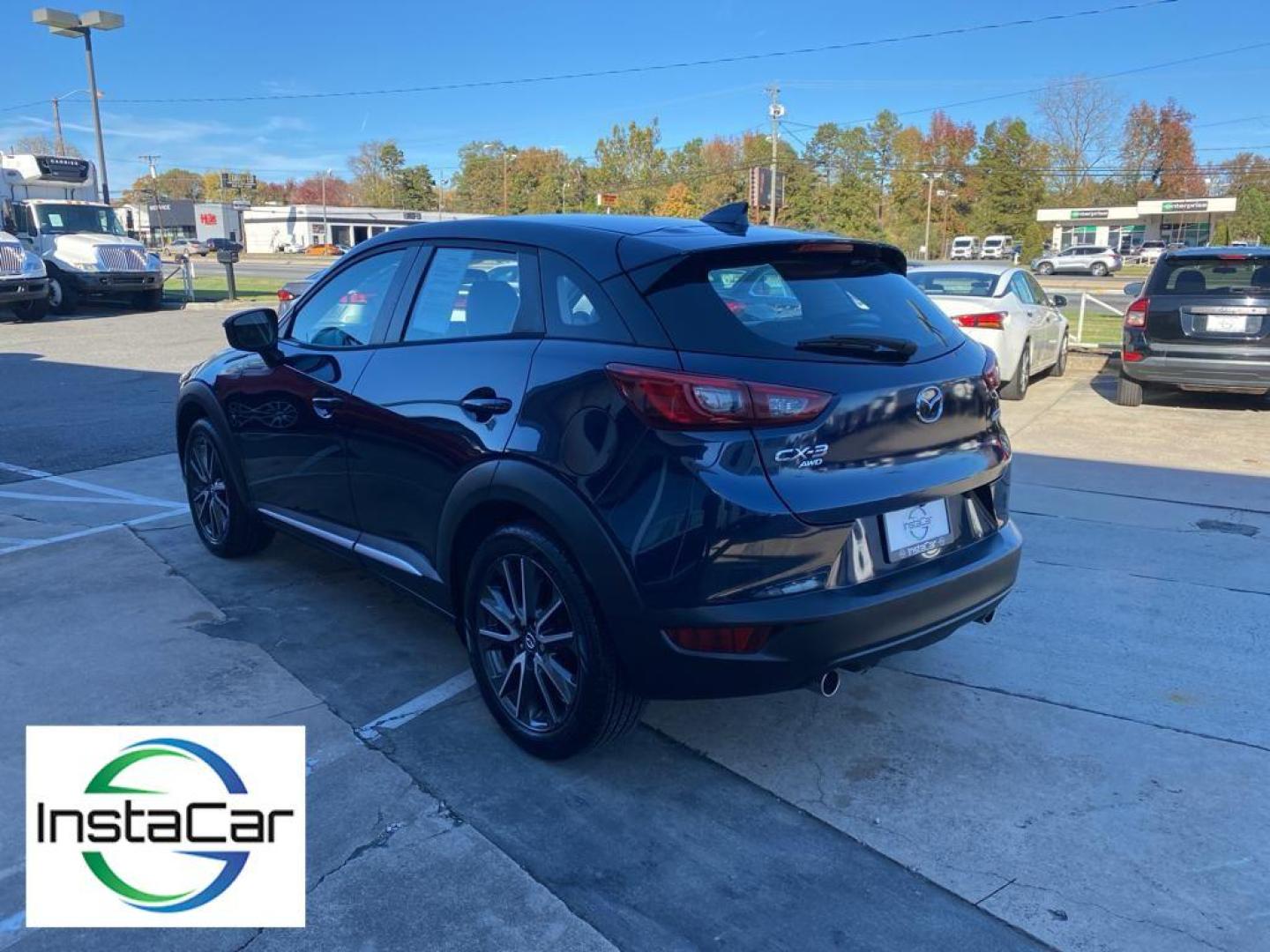 2017 Deep Crystal Blue Mica /Black Mazda CX-3 Grand Touring (JM1DKFD77H0) with an 4 Cyl, 2.0L engine, 6-speed automatic transmission, located at 3147 E Independence Blvd, Charlotte, NC, 28205, 35.200268, -80.773651 - Photo#11