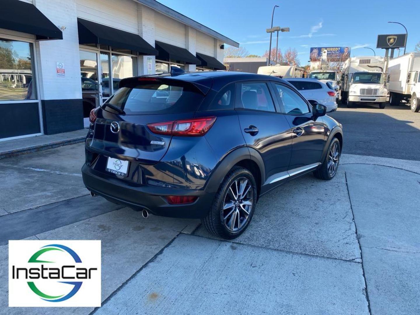 2017 Deep Crystal Blue Mica /Black Mazda CX-3 Grand Touring (JM1DKFD77H0) with an 4 Cyl, 2.0L engine, 6-speed automatic transmission, located at 3147 E Independence Blvd, Charlotte, NC, 28205, 35.200268, -80.773651 - Photo#13