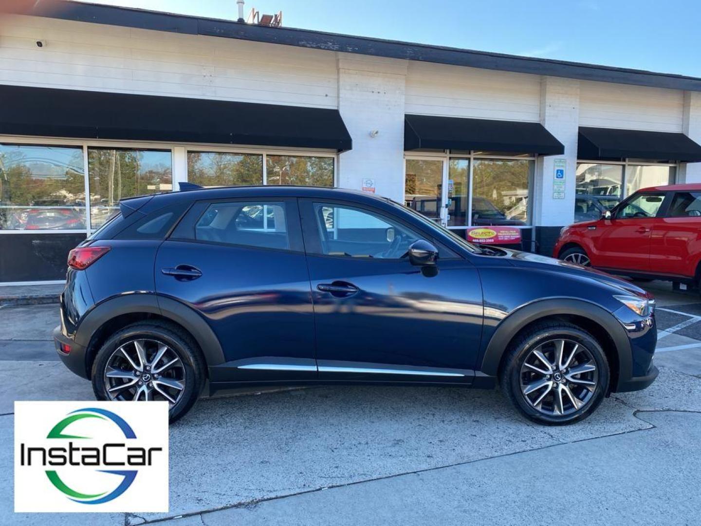 2017 Deep Crystal Blue Mica /Black Mazda CX-3 Grand Touring (JM1DKFD77H0) with an 4 Cyl, 2.0L engine, 6-speed automatic transmission, located at 3147 E Independence Blvd, Charlotte, NC, 28205, 35.200268, -80.773651 - Photo#14